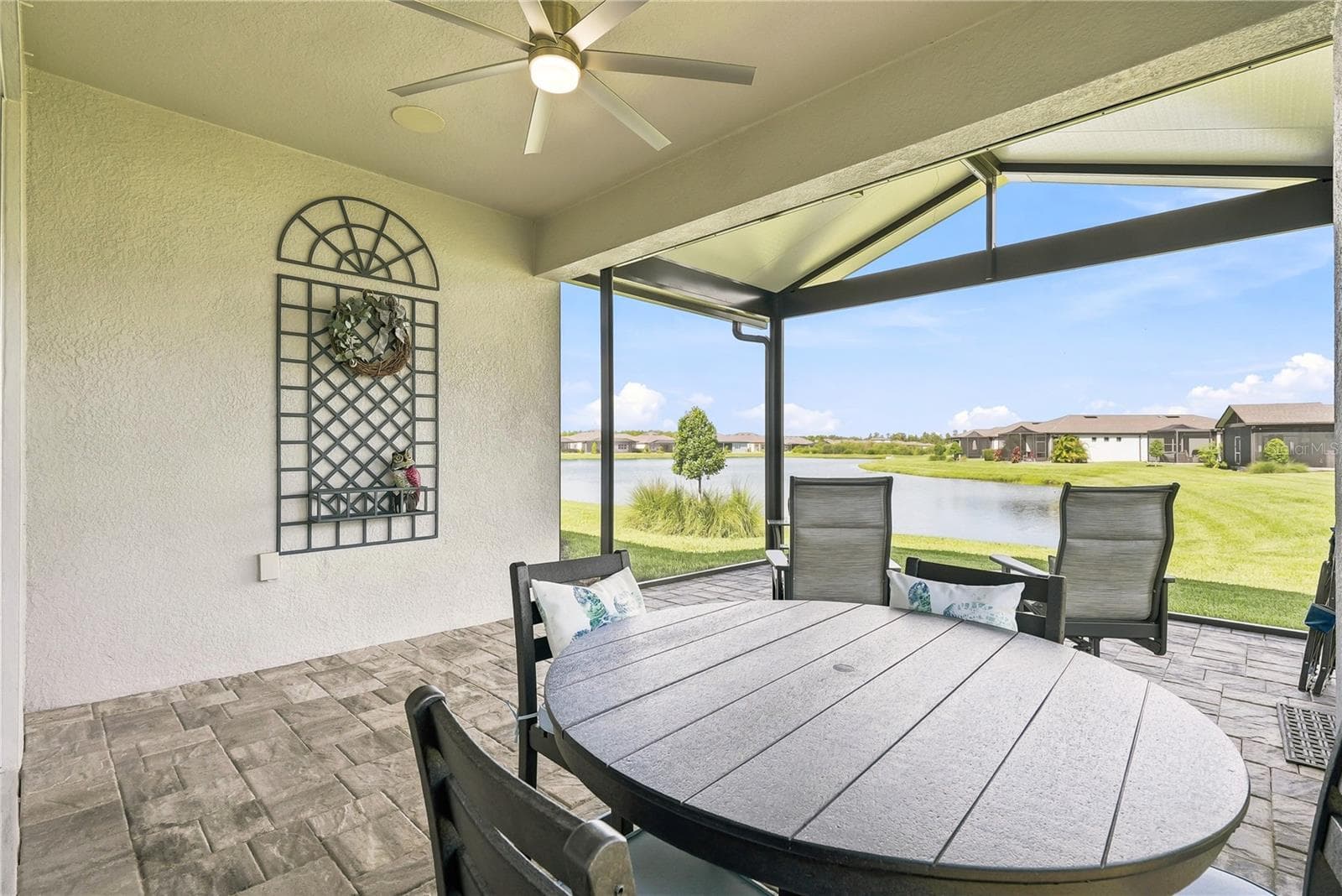 Unwind and watch the birds from this great spot on the lanai. - 5535 BLUE CRUSH BND, LAND O LAKES