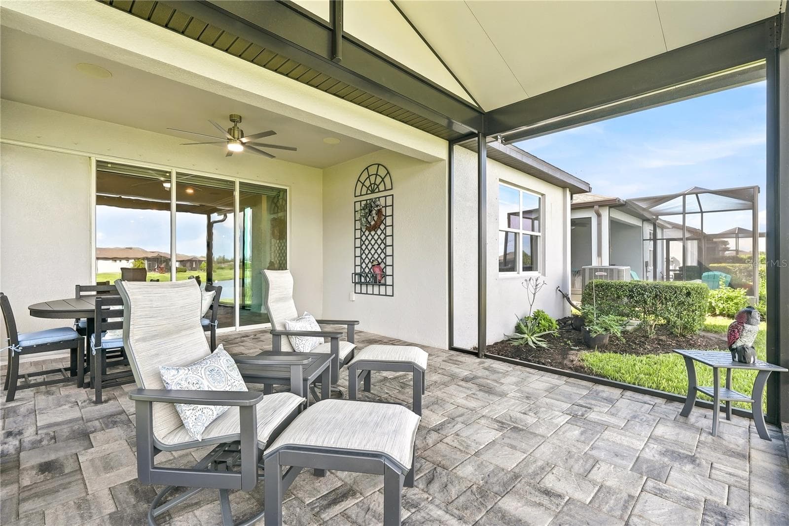 Lanai with pavers. - 5535 BLUE CRUSH BND, LAND O LAKES
