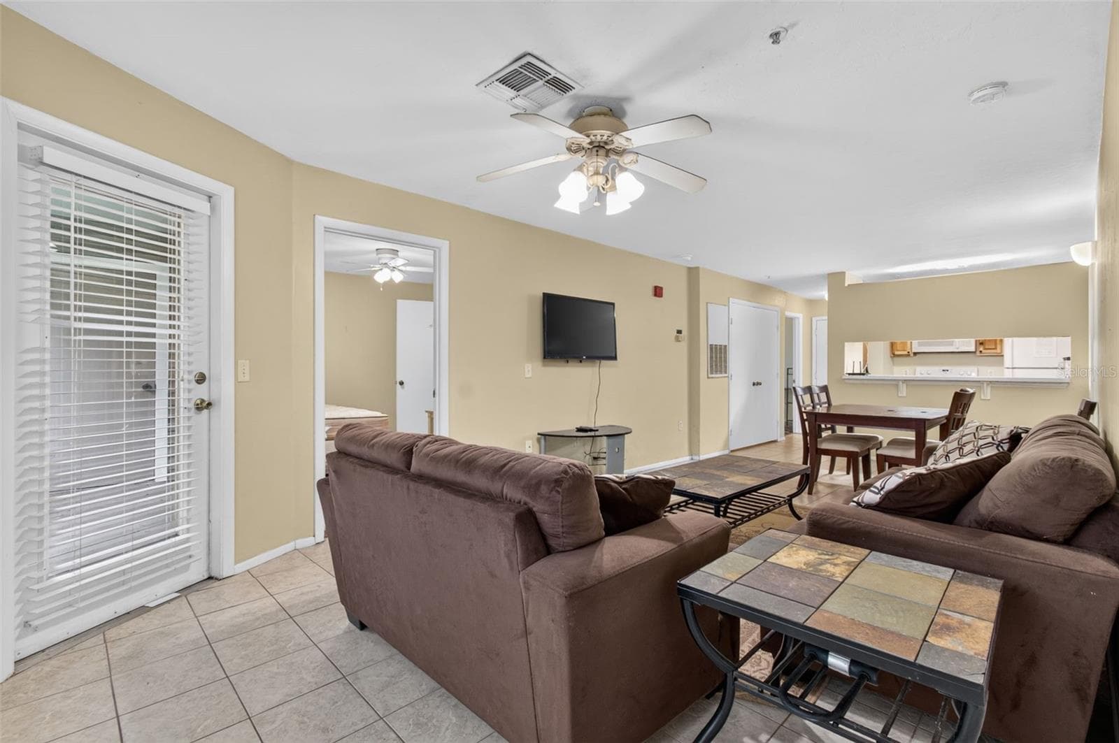 Living Area/Door to back Patio - 4000 SW 23RD ST #2-105, GAINESVILLE