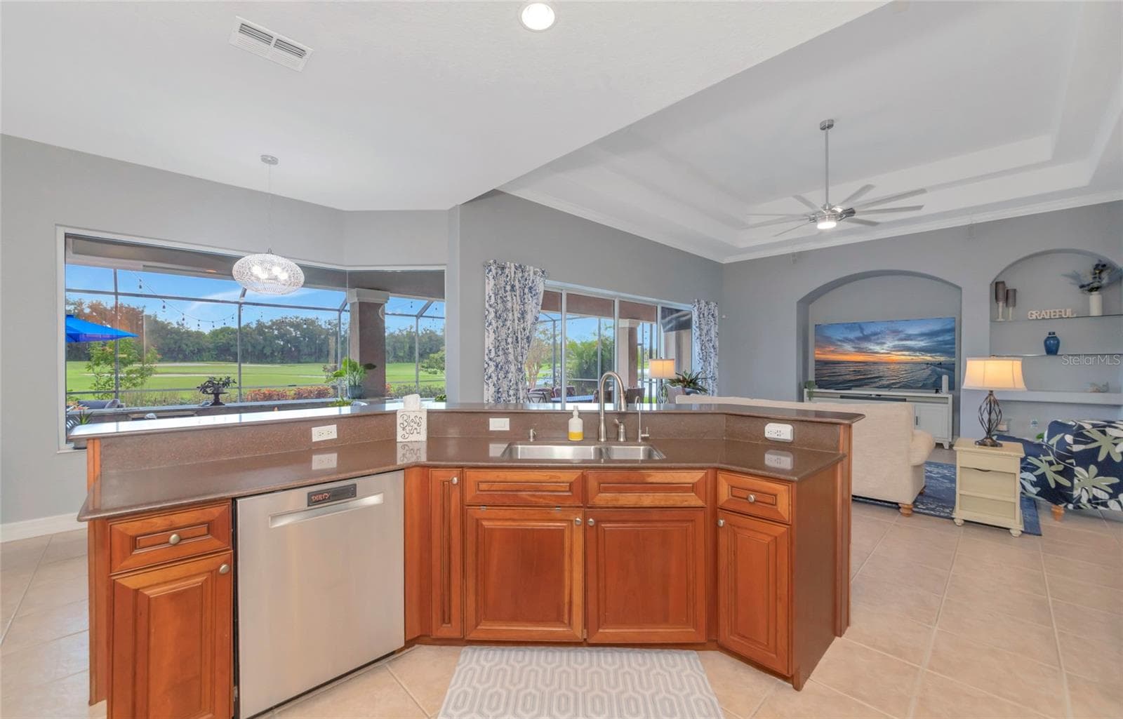 Open kitchen into the great room stainless steel appliances - 817 MARITIME CT, BRADENTON