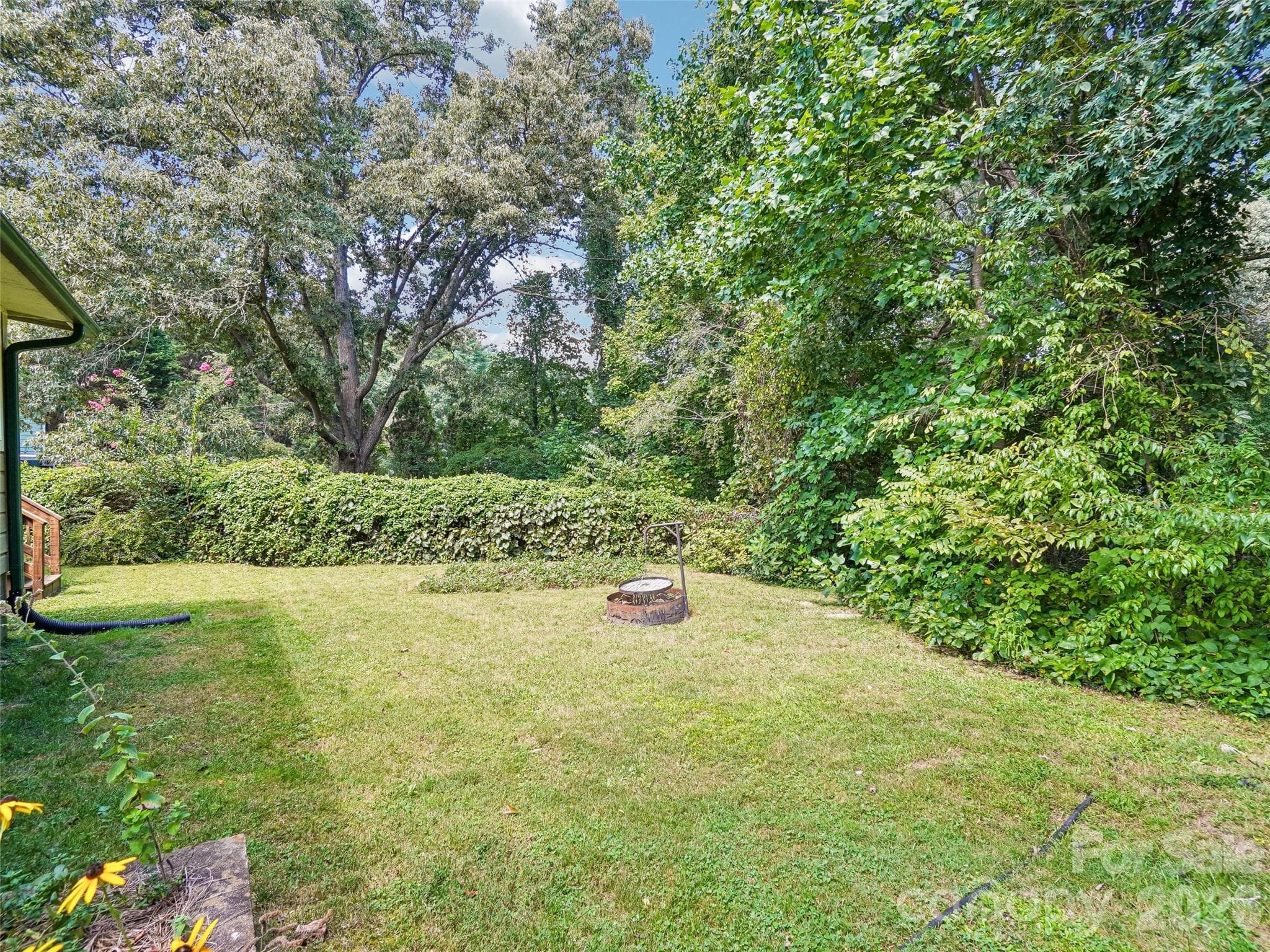 level lot lovingly planted for year round enjoyment - 75 Cisco Road, Asheville