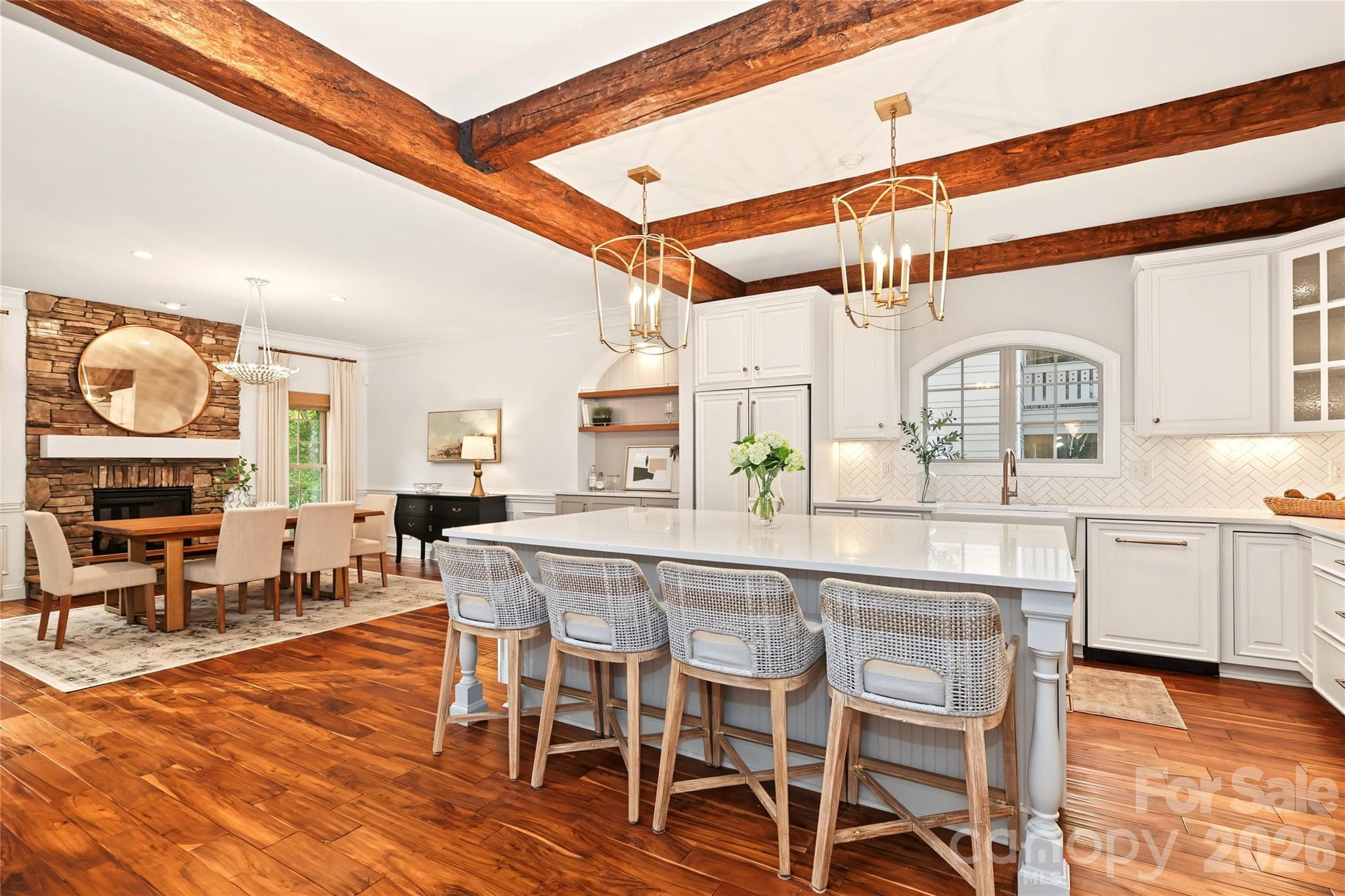 Incredible open kitchen with large island is the heart of the home. - 4934 Spalding Place, Charlotte