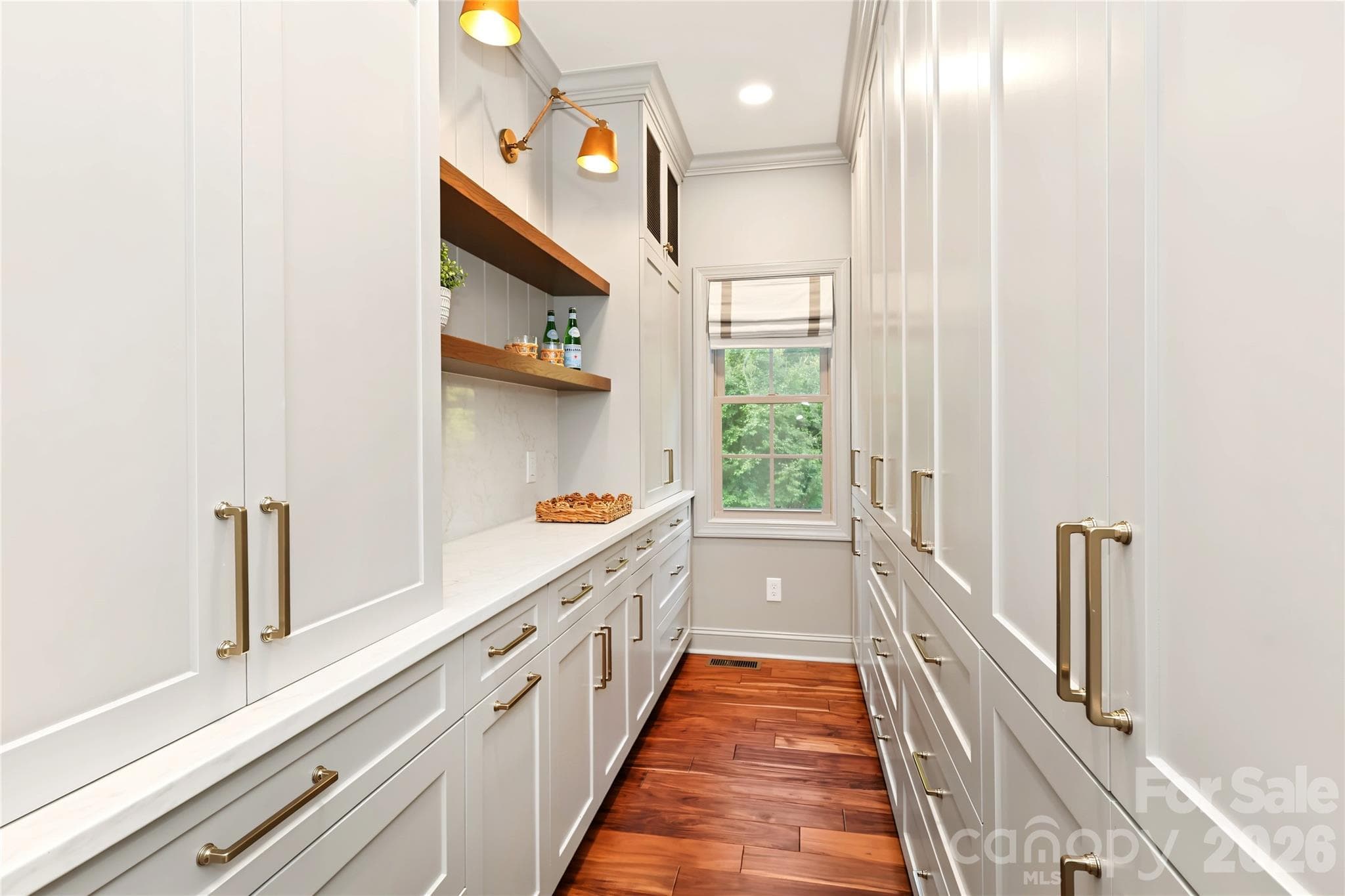 Incredible scullery with tons of built-in cabinets and storage. - 4934 Spalding Place, Charlotte