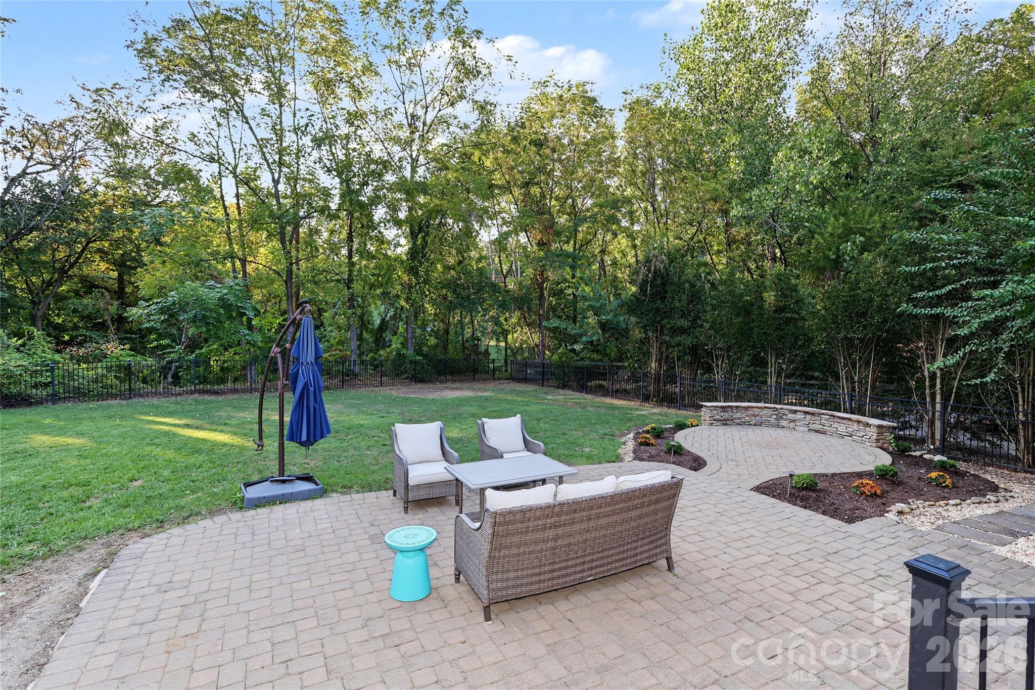 Patio with large fenced backyard - 4934 Spalding Place, Charlotte
