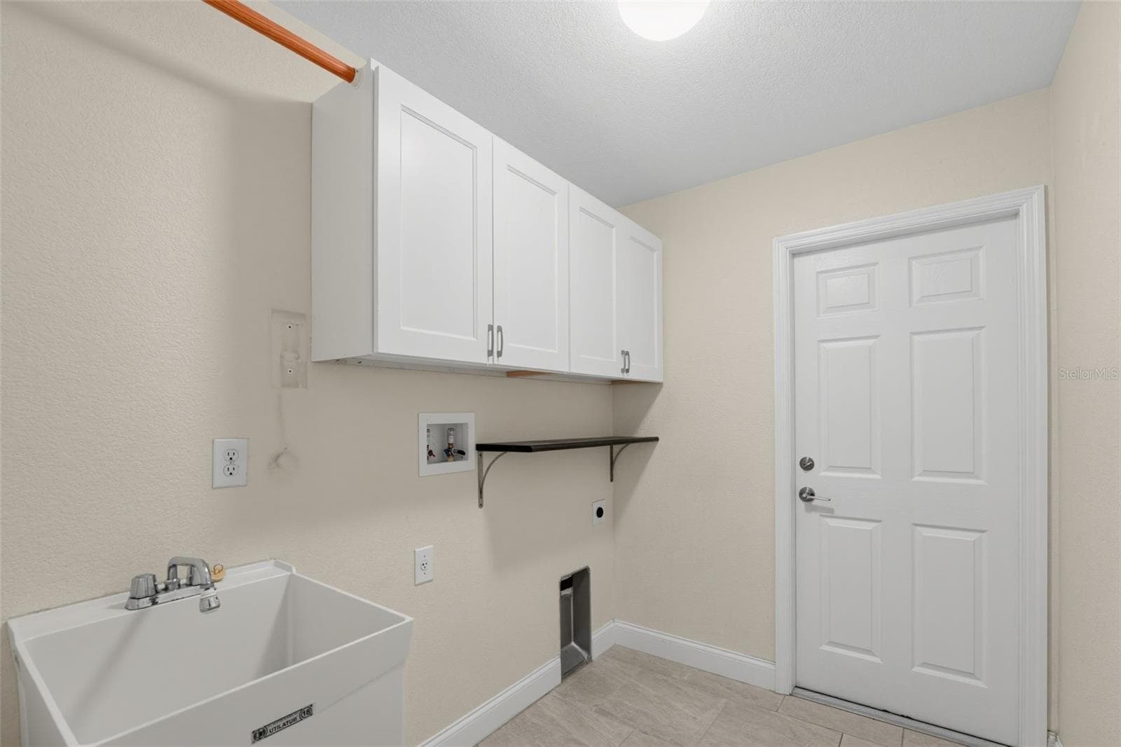 Laundry Room goes out to garage - 2580 VOGLER LN, NORTH PORT