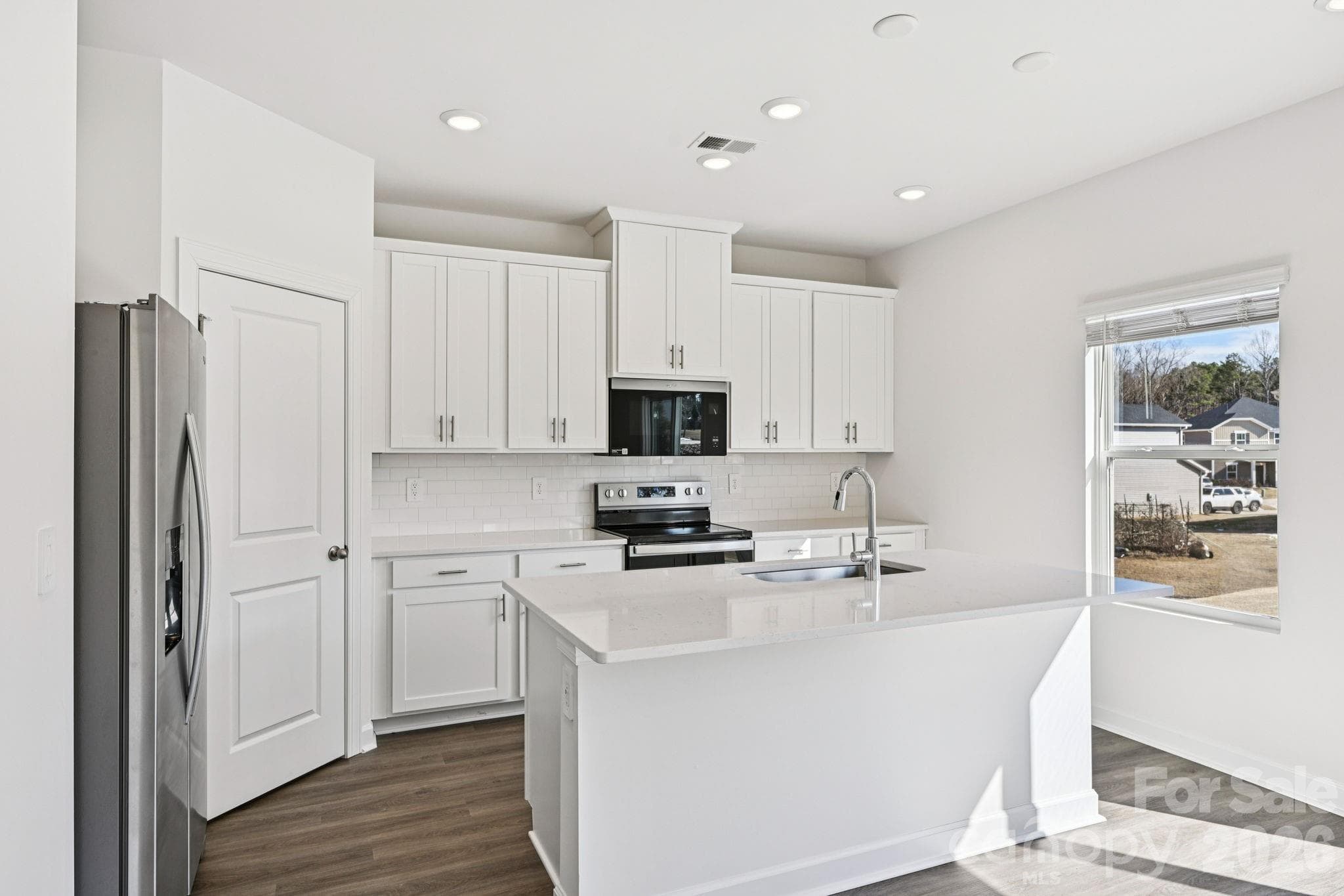 Photo is not of the actual home, but is an inspirational photo of builder’s model home and may depict options, furnishings, and/or decorator features that are not included - 2411 Chartwell Street, Stanley