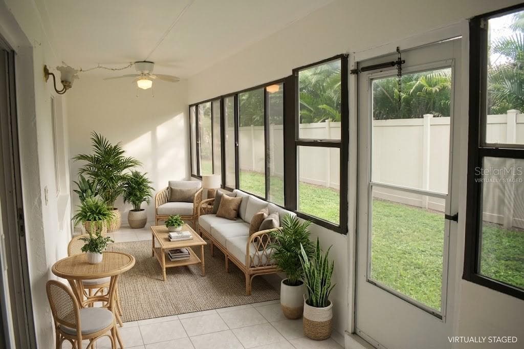 virtually staged porch - 4435 1ST ST NE #111, ST PETERSBURG