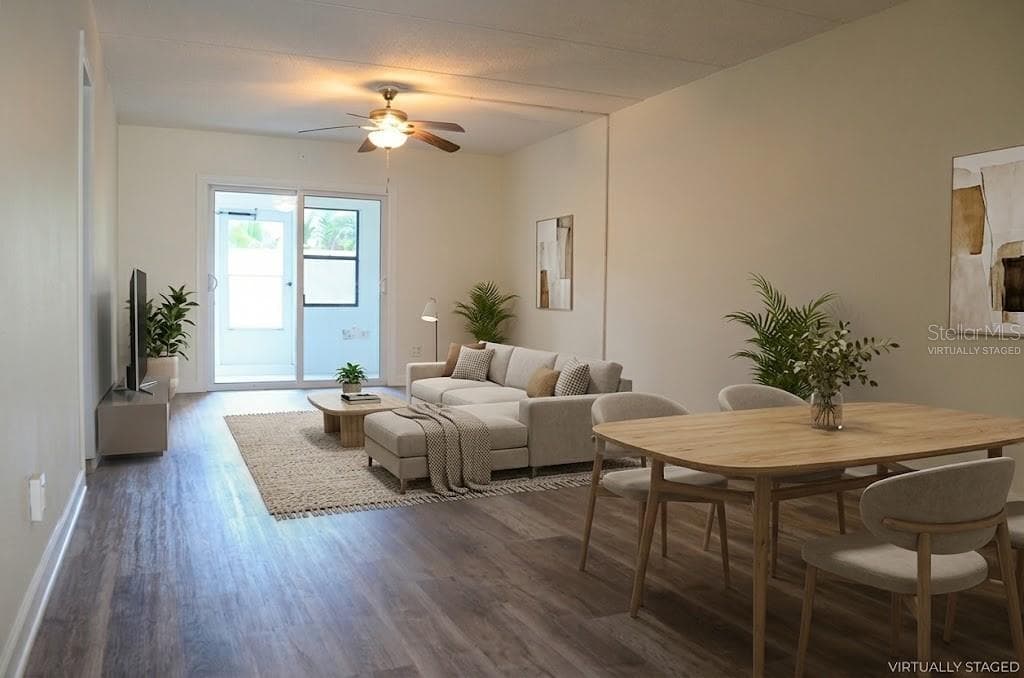 virtually staged living and dining areas - 4435 1ST ST NE #111, ST PETERSBURG