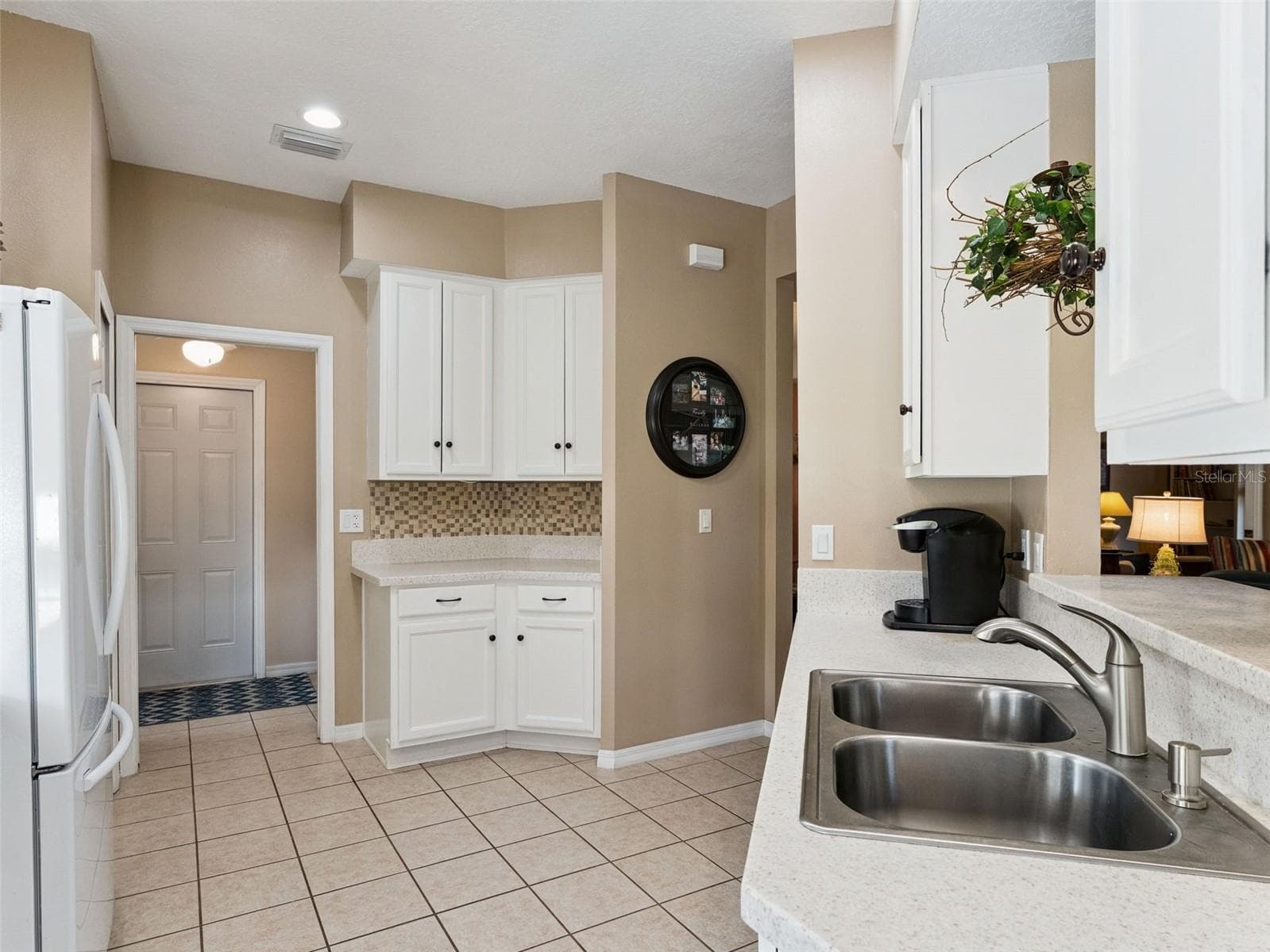 The Kitchen appliances are newer and the refrigerator is only a year old. - 5401 ESSEX CT, LEESBURG