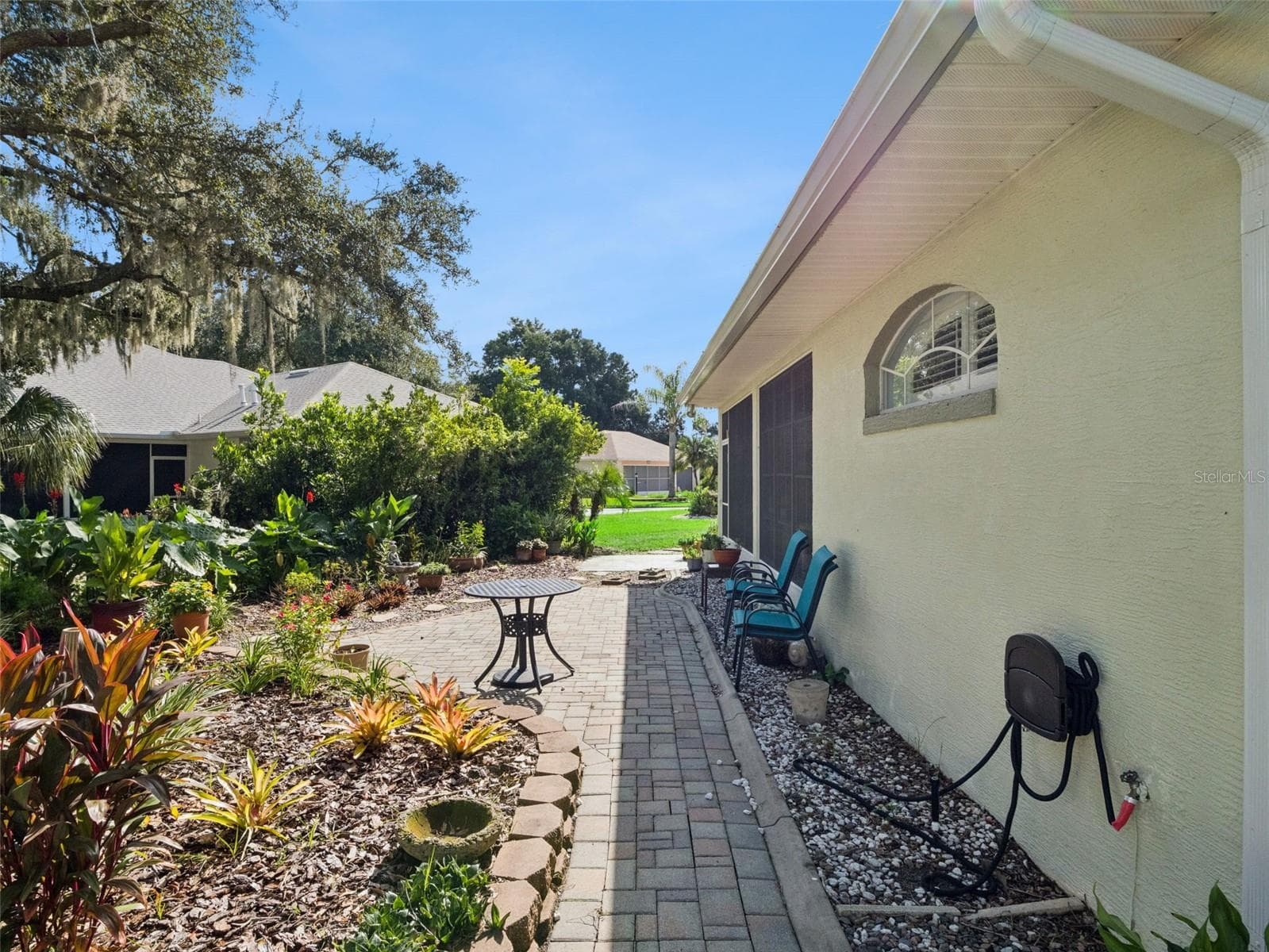 The rear patio has space to grill and nature watch. - 5401 ESSEX CT, LEESBURG