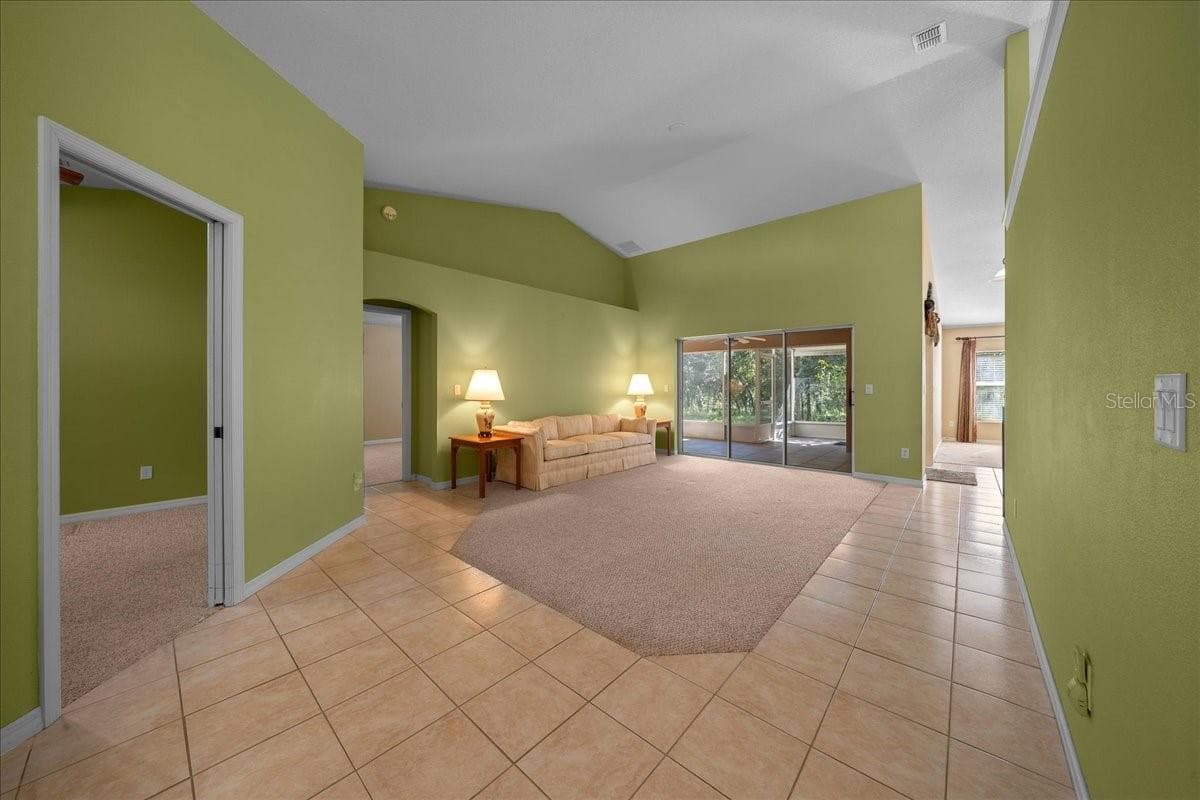 Formal Living Room w/screened back patio access - 8479 SW 134TH AVE, DUNNELLON