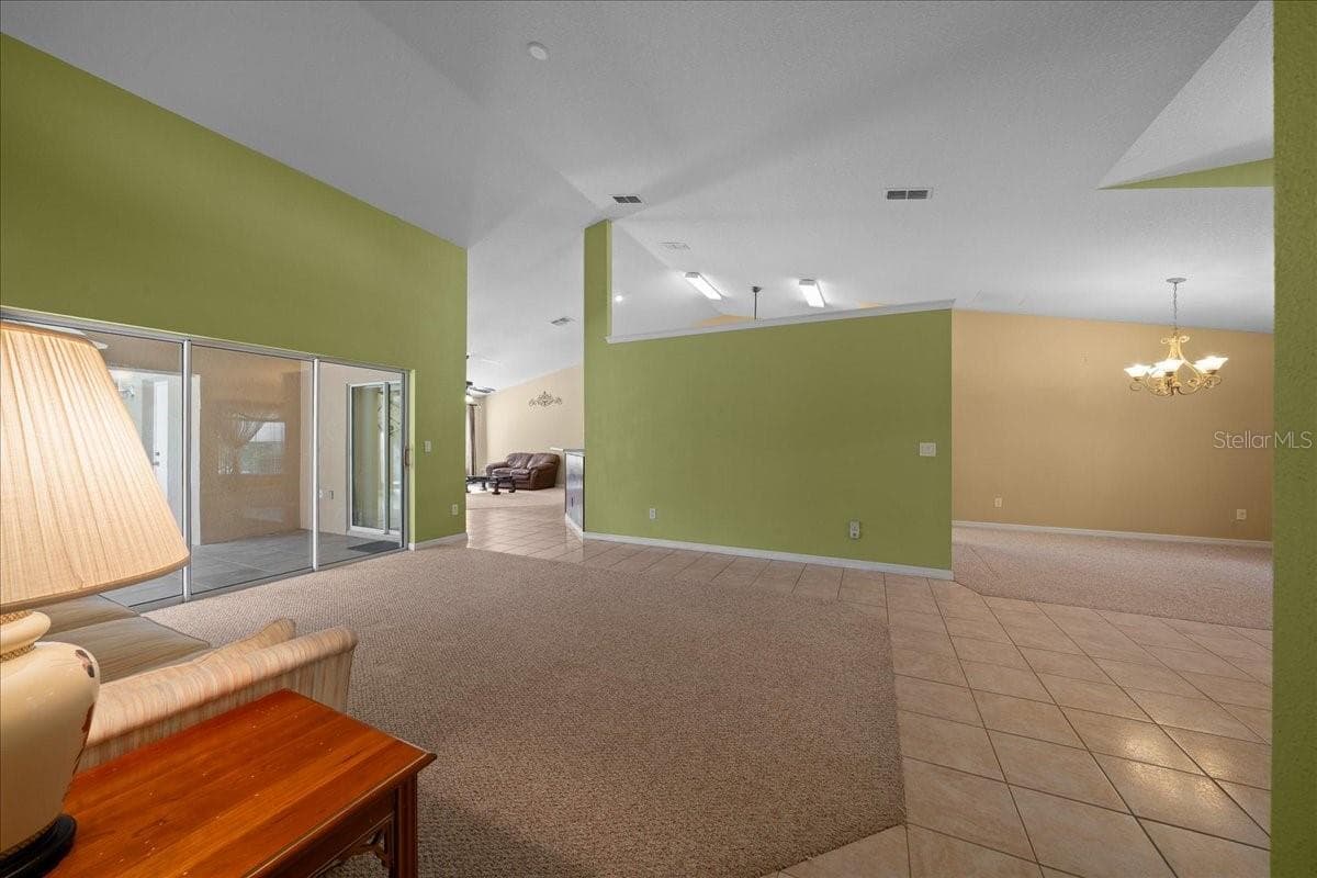 Formal living room looking into Family room - 8479 SW 134TH AVE, DUNNELLON