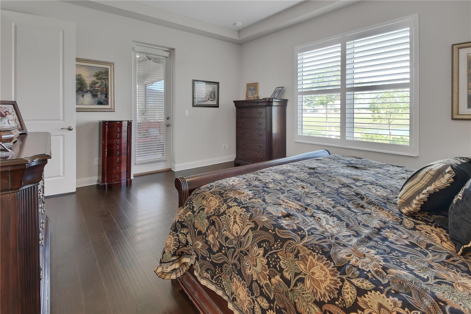 French door to lanai and view of pond from bedroom - 1011 MEGANO BLVD, DELAND