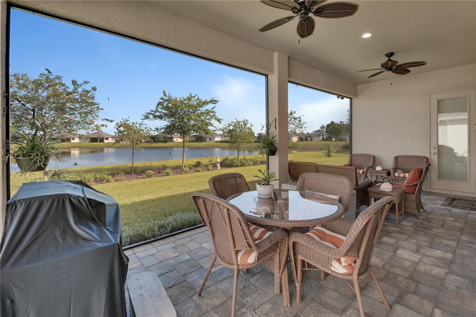 Dining and sitting areas on Lanai - 1011 MEGANO BLVD, DELAND