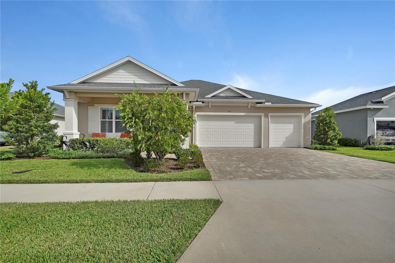 Front View, extra landscaping and flowering plants - 1011 MEGANO BLVD, DELAND