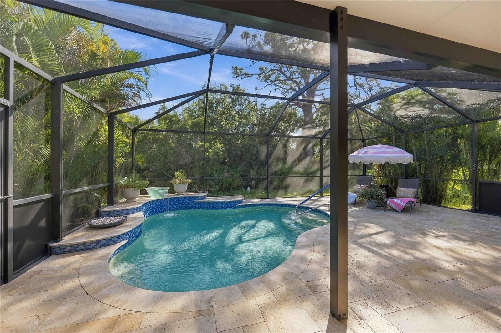 Salt water heated pool overlooking mature trees and landscaping - 216 MARCHENO WAY, NORTH VENICE