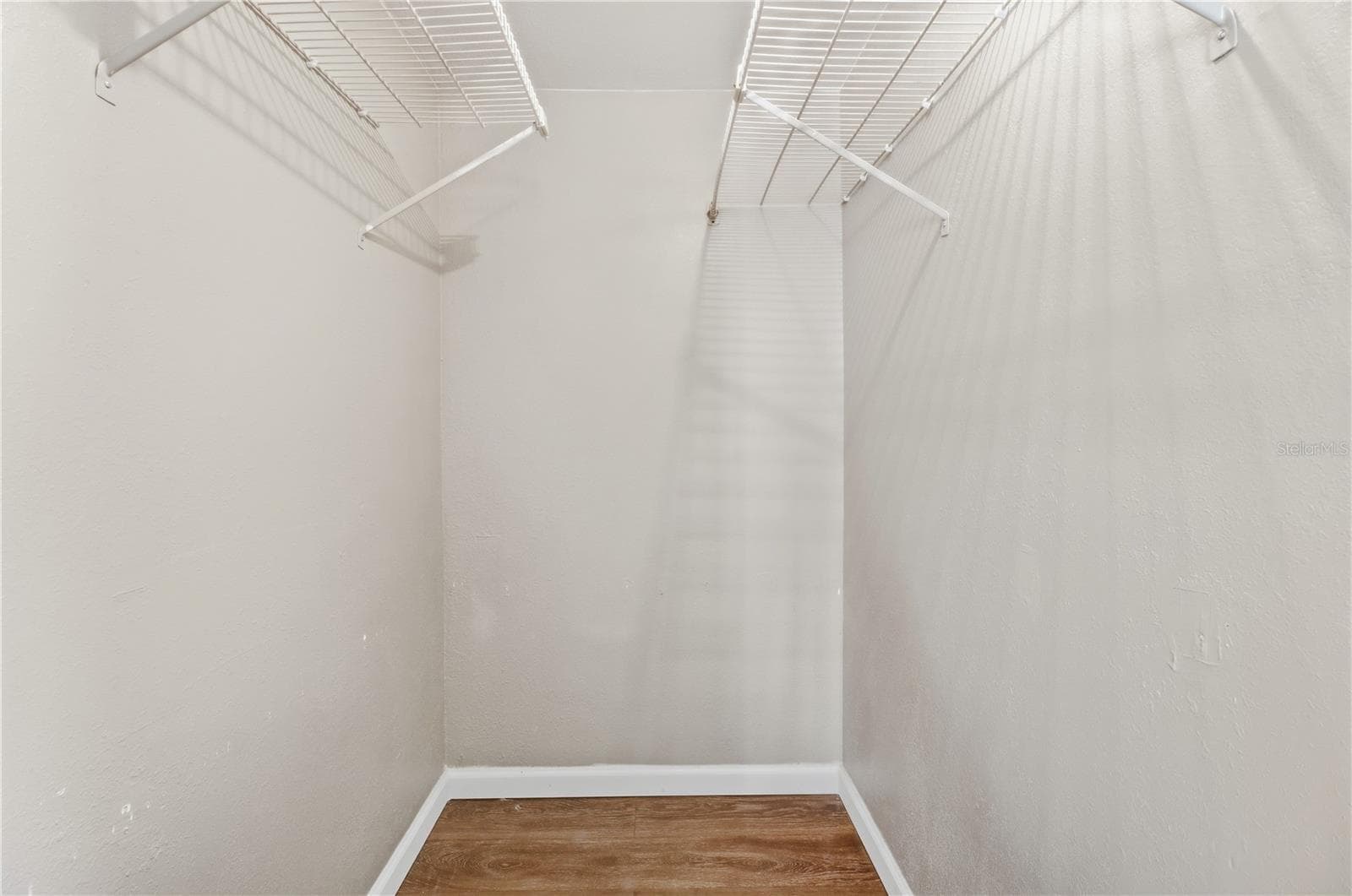 Primary Bedroom Walk-in Closet - 3770 SW 147TH LANE RD, OCALA