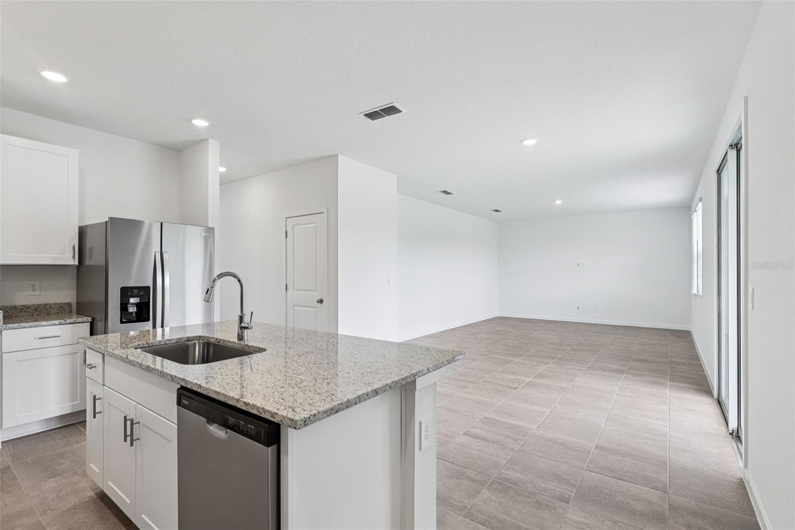 The interior photos are of another home with the same floor plan but different interior color package finishes. Some details may vary - 89 WANDERING CREEK WAY, PALM COAST
