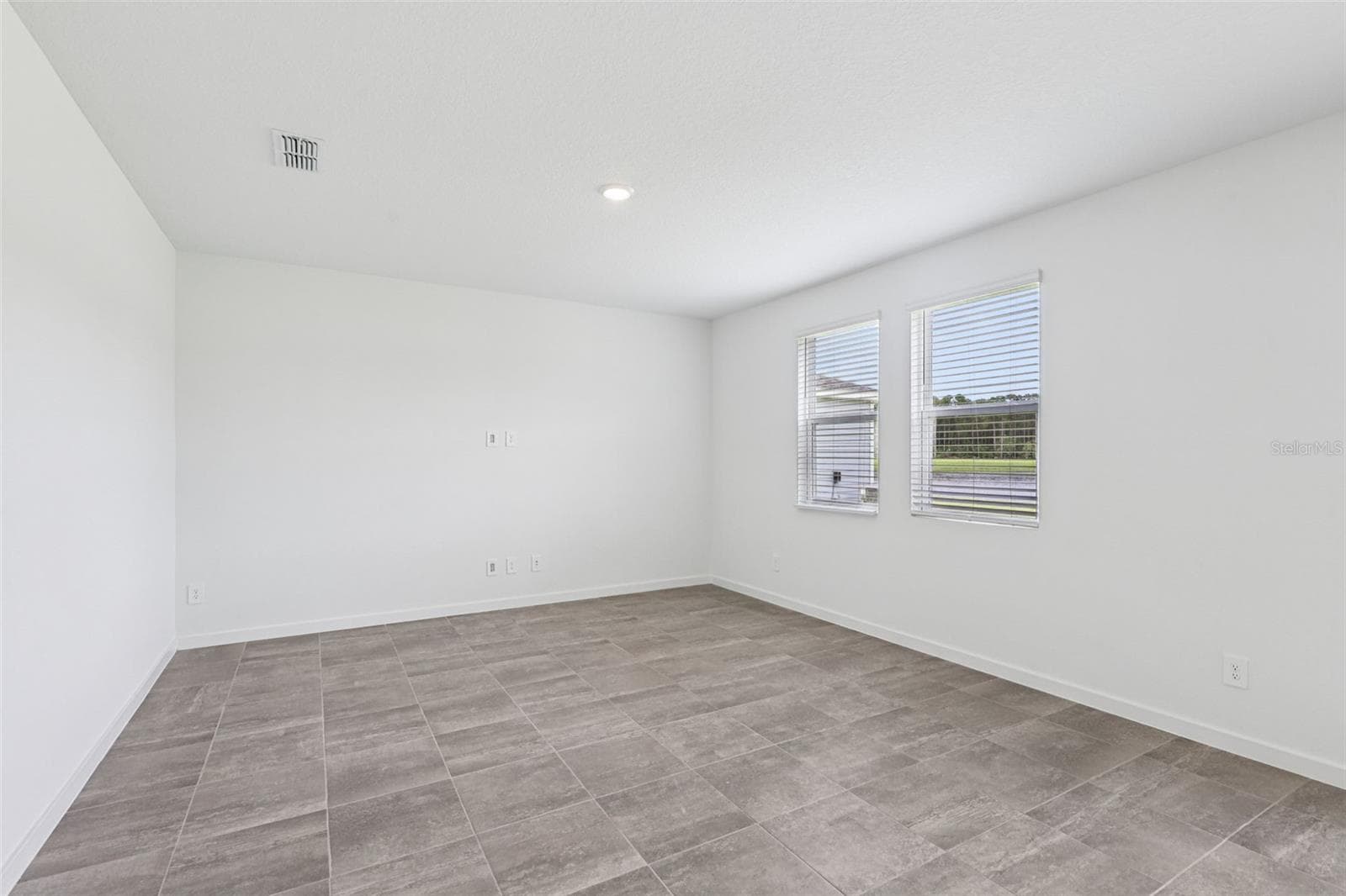 The interior photos are of another home with the same floor plan but different interior color package finishes. Some details may vary - 89 WANDERING CREEK WAY, PALM COAST