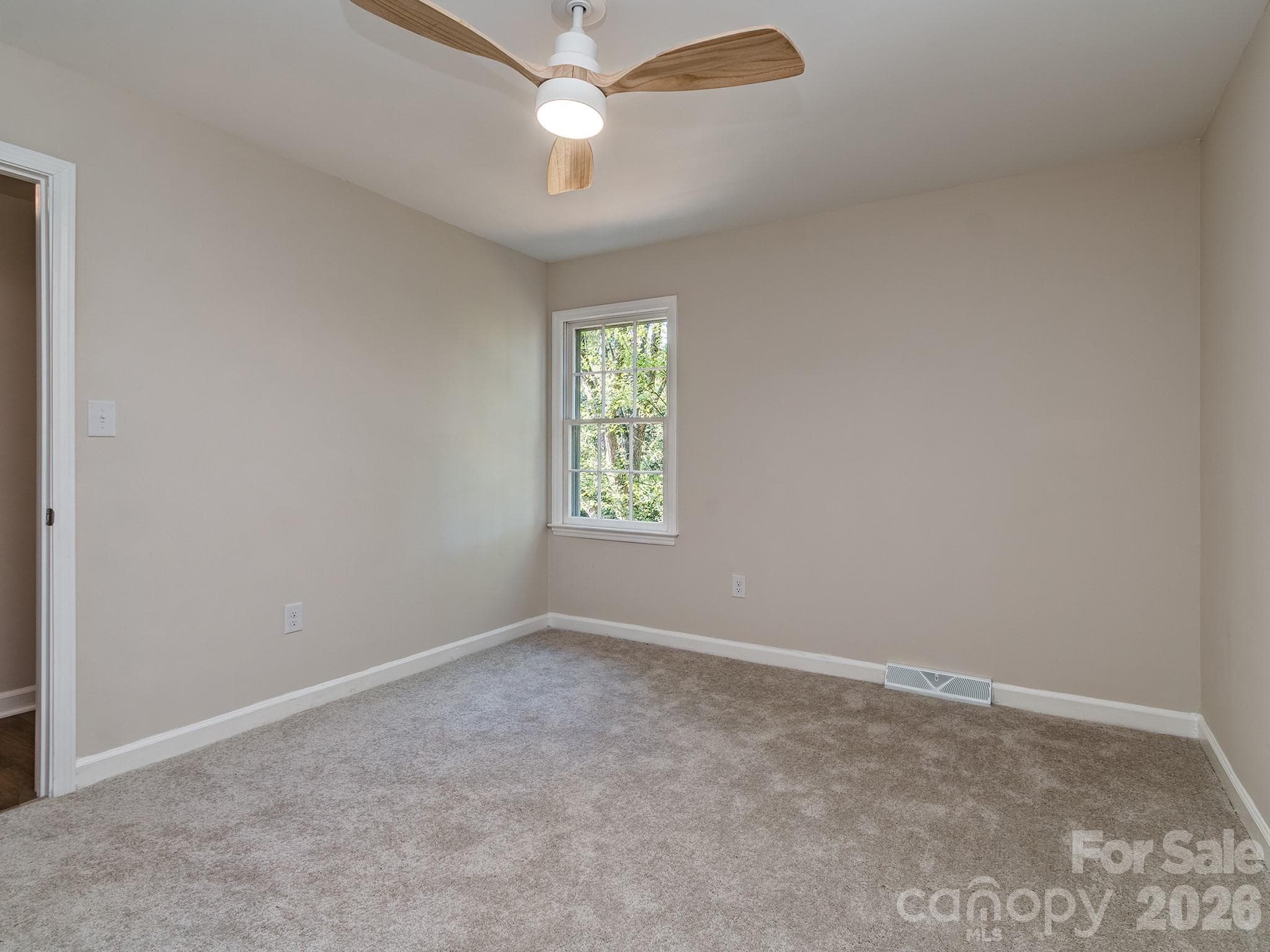 Bedroom #3 is upstairs, carpeted with a large closet with organized shelving. Fan works with remote. - 2041 Glouchester Circle, Charlotte