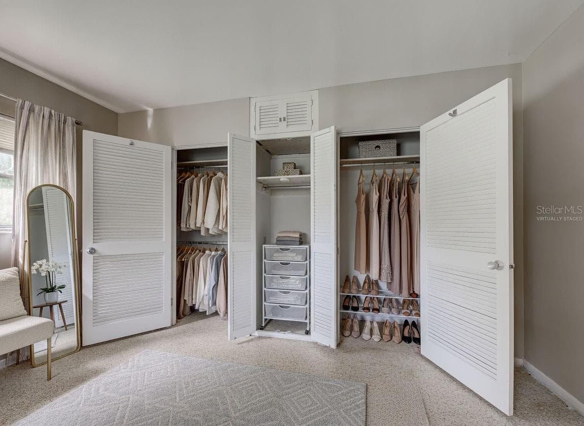 Virtually Staged Primary Closets - 22542 ELMIRA BLVD, PORT CHARLOTTE
