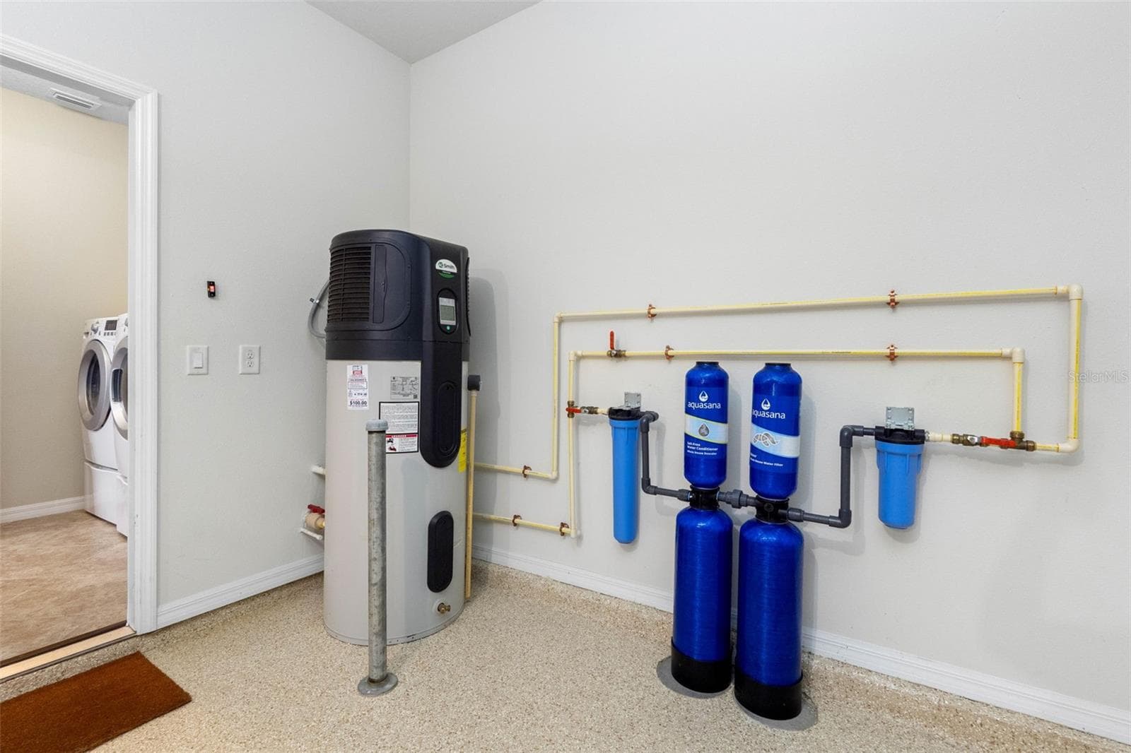 Garage, Water filtration system throughout entire home - 7949 TASSO CT, SEMINOLE