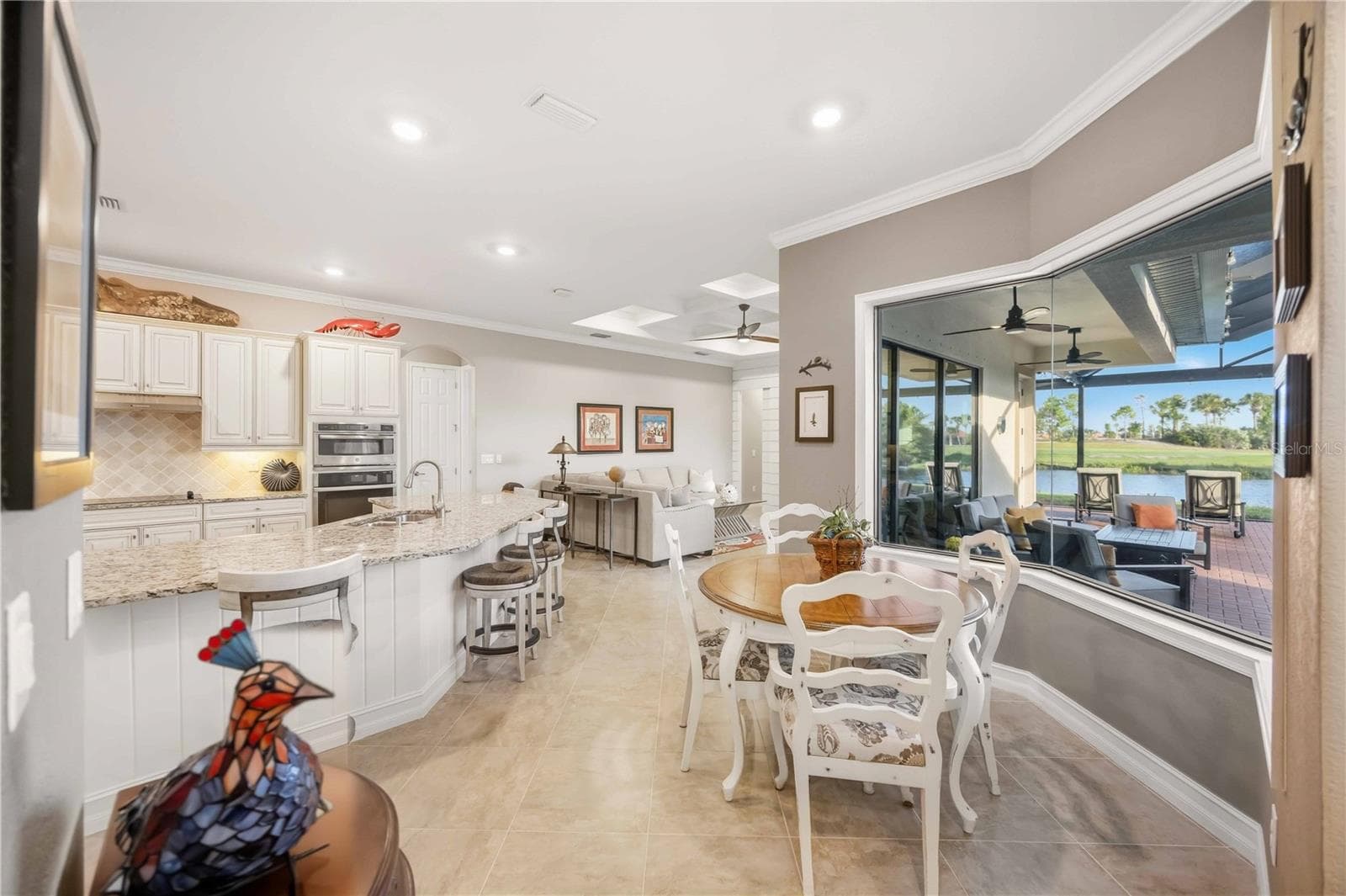 Kitchen and dinette with the aquarium window - 10720 TARFLOWER DR, VENICE