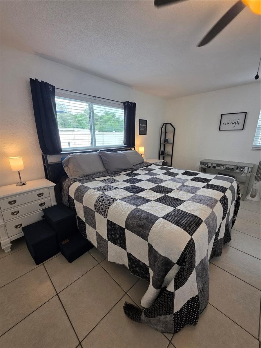 This primary bedroom is Light, bright and spacious - 1535 URBANA AVENUE, DELTONA