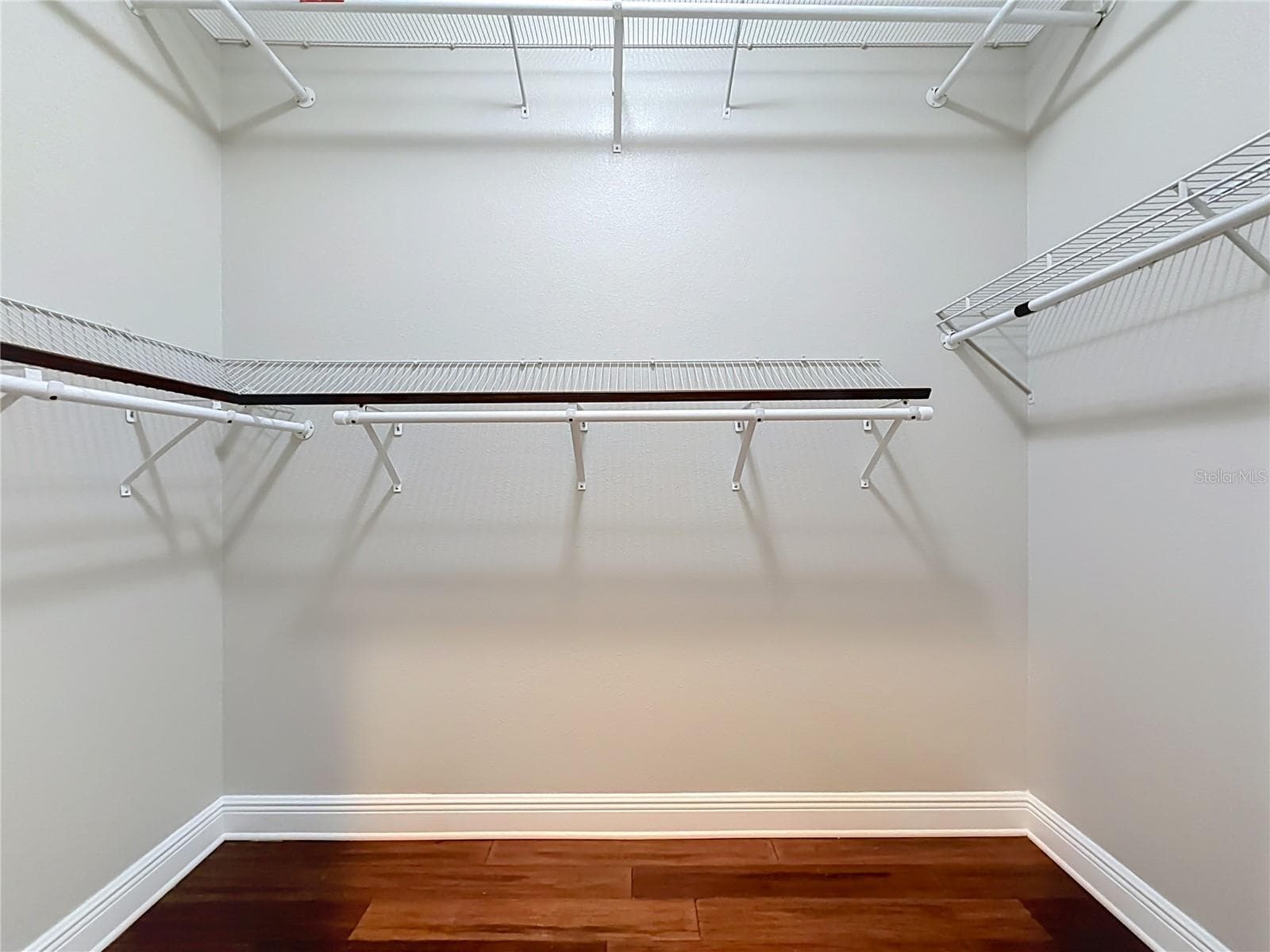 His closet - 12821 BRUNELLO CIR, CLERMONT