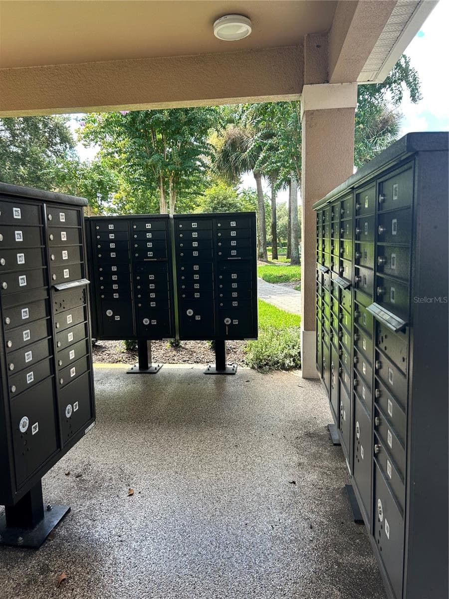 Centralized cluster mailboxes located at the front entrance of the community. - 2051 RETREAT VIEW CIR, SANFORD