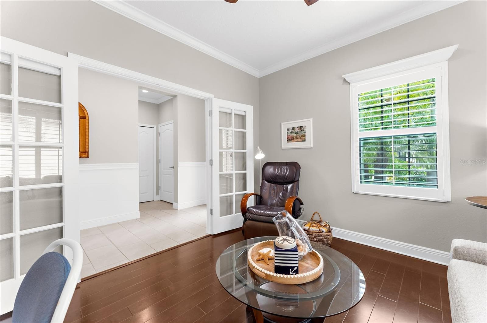 Den with French Doors - 208 CAPRIANA CT, NOKOMIS