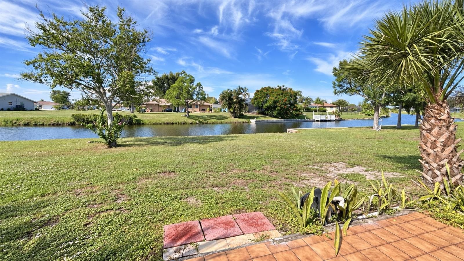 The rear porch view of the freshwater canal. Sit outside every morning and enjoy it. - 160 ANNAPOLIS LN, ROTONDA WEST