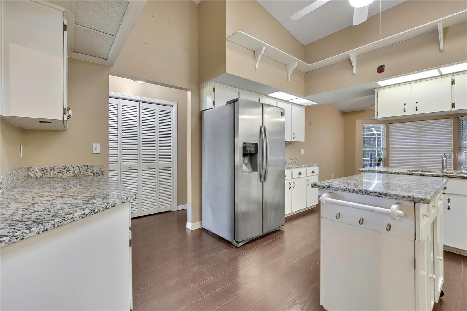 Kitchen with granite countertops and center island - 1097 FLORIAN WAY, SPRING HILL
