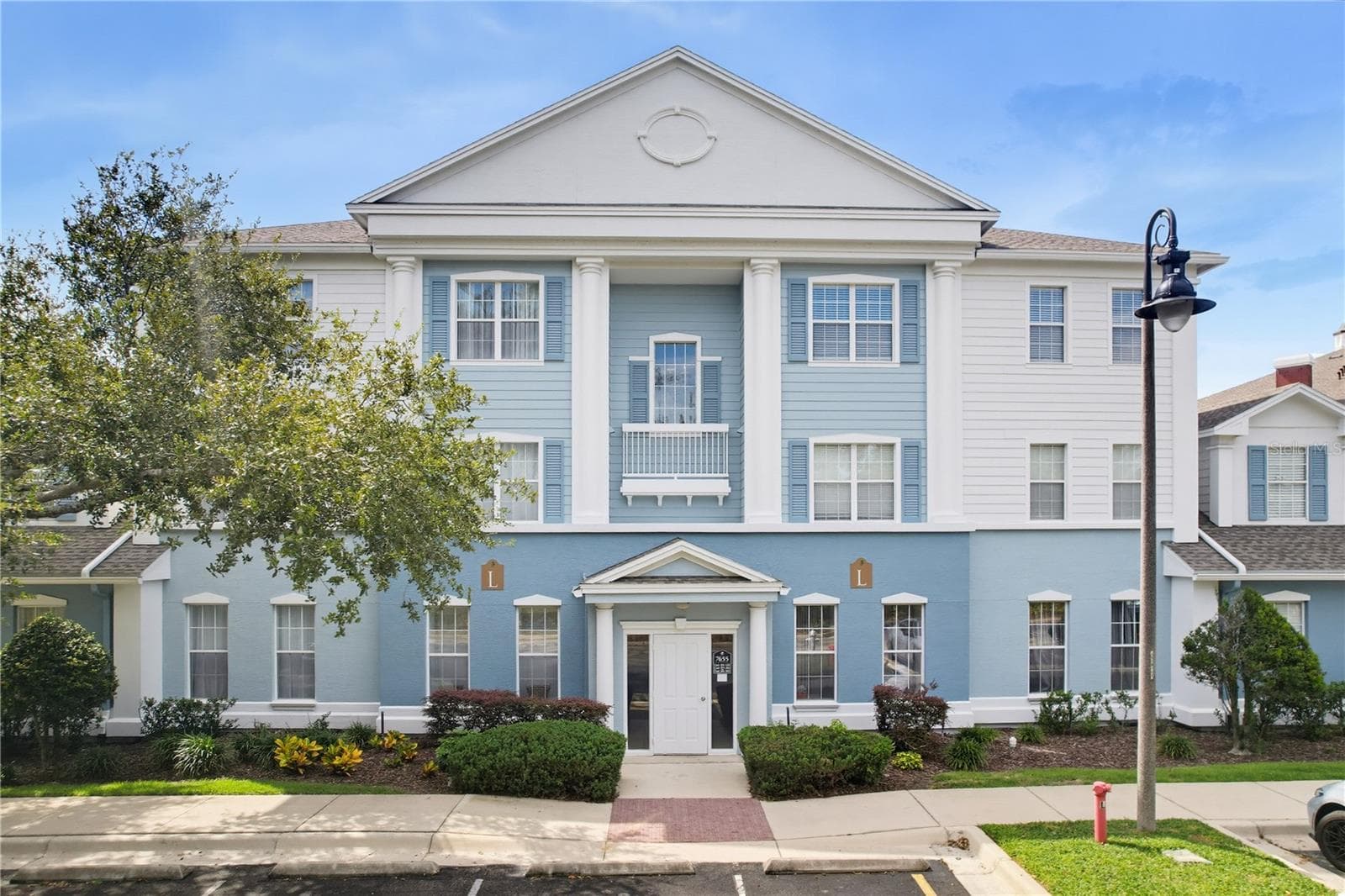 Front of the Building - 7655 HERITAGE CROSSING WAY #102, KISSIMMEE
