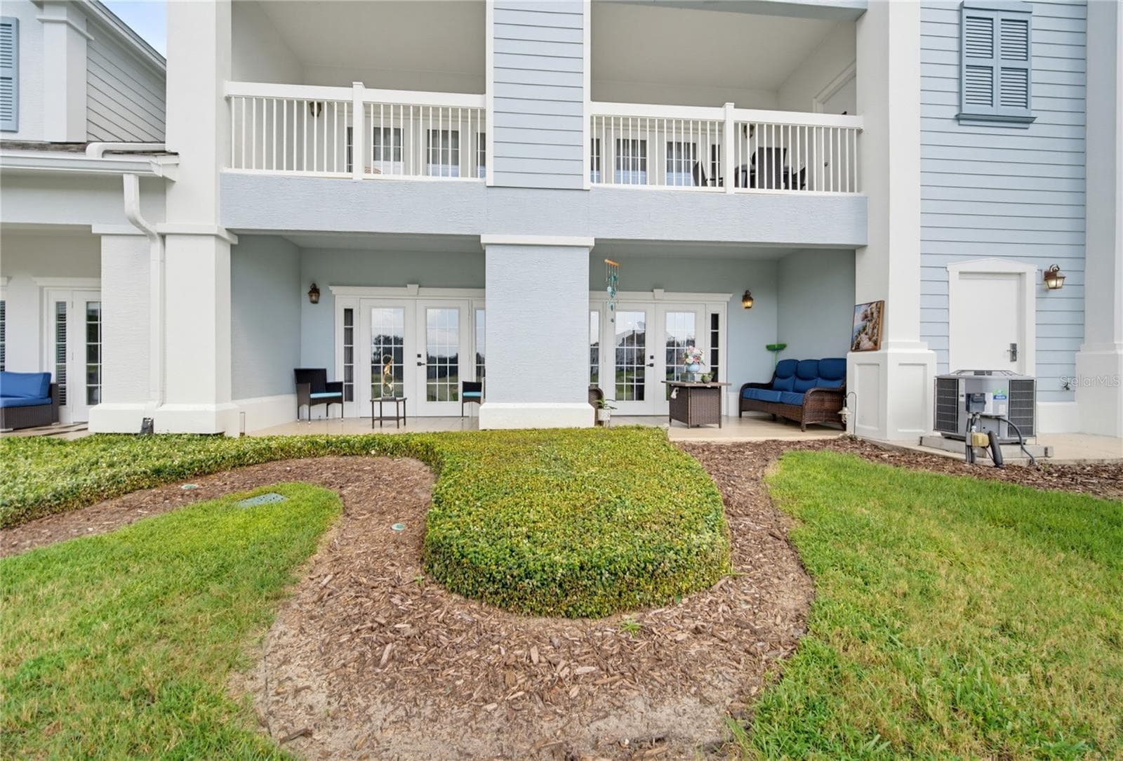 Rear Balconies - 7655 HERITAGE CROSSING WAY #102, KISSIMMEE