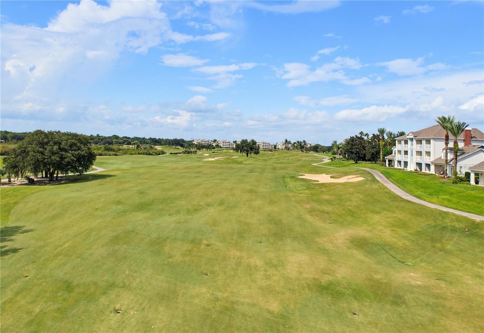 Golf Views - 7655 HERITAGE CROSSING WAY #102, KISSIMMEE