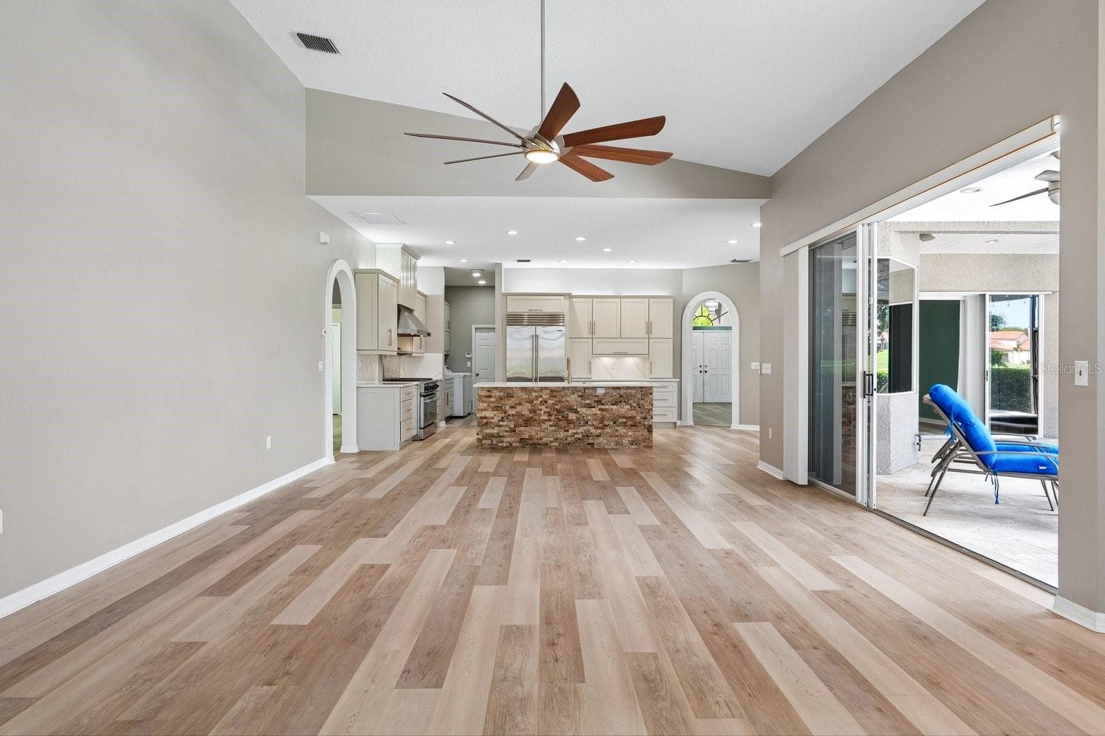 Family Room with Sliders to Pool - 1003 KINGS WAY LN, TARPON SPRINGS
