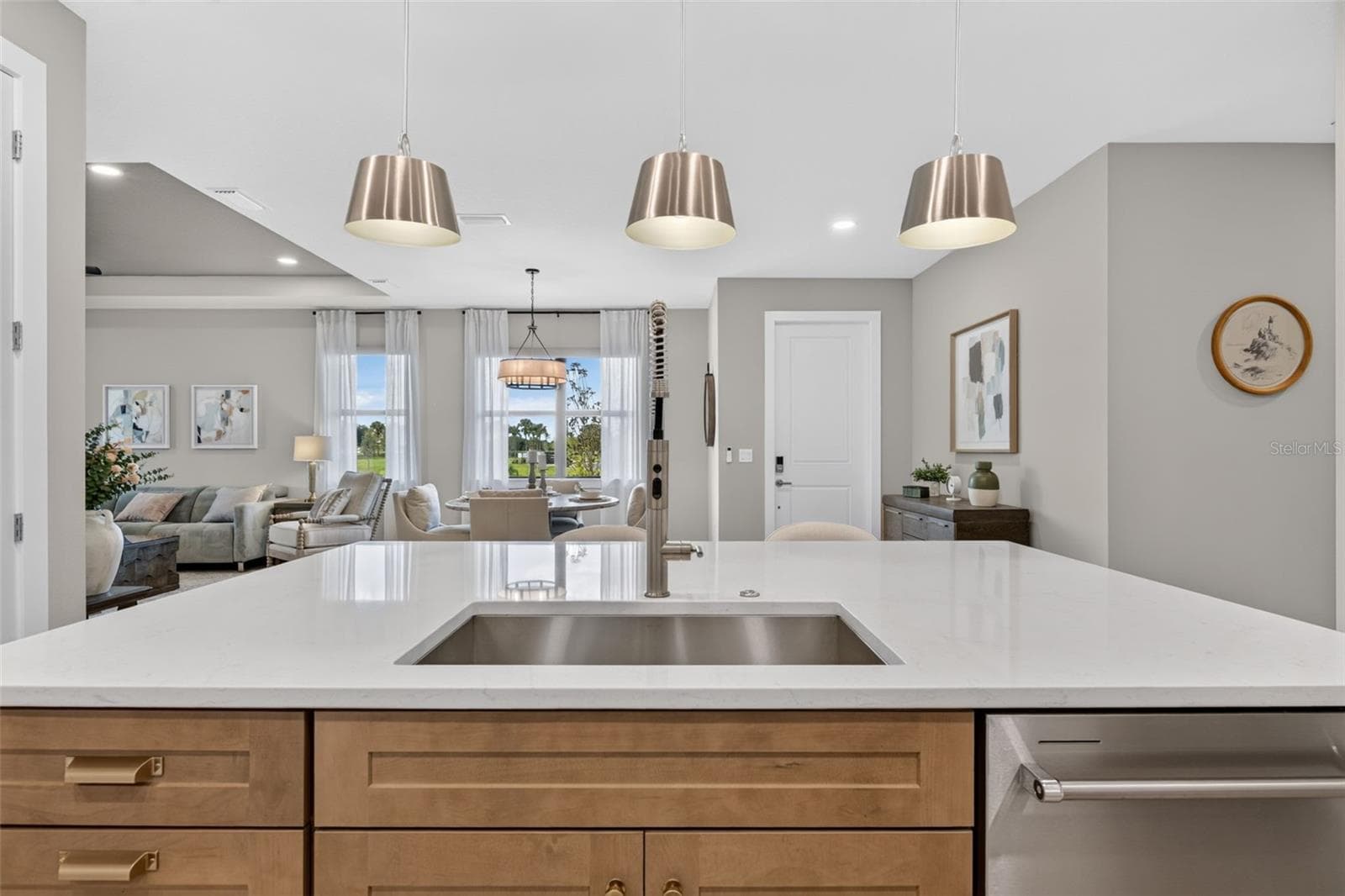 Large Kitchen Island with Complementary Contrasting Cabinetry - 18911 DAYSPRING PL, VENICE