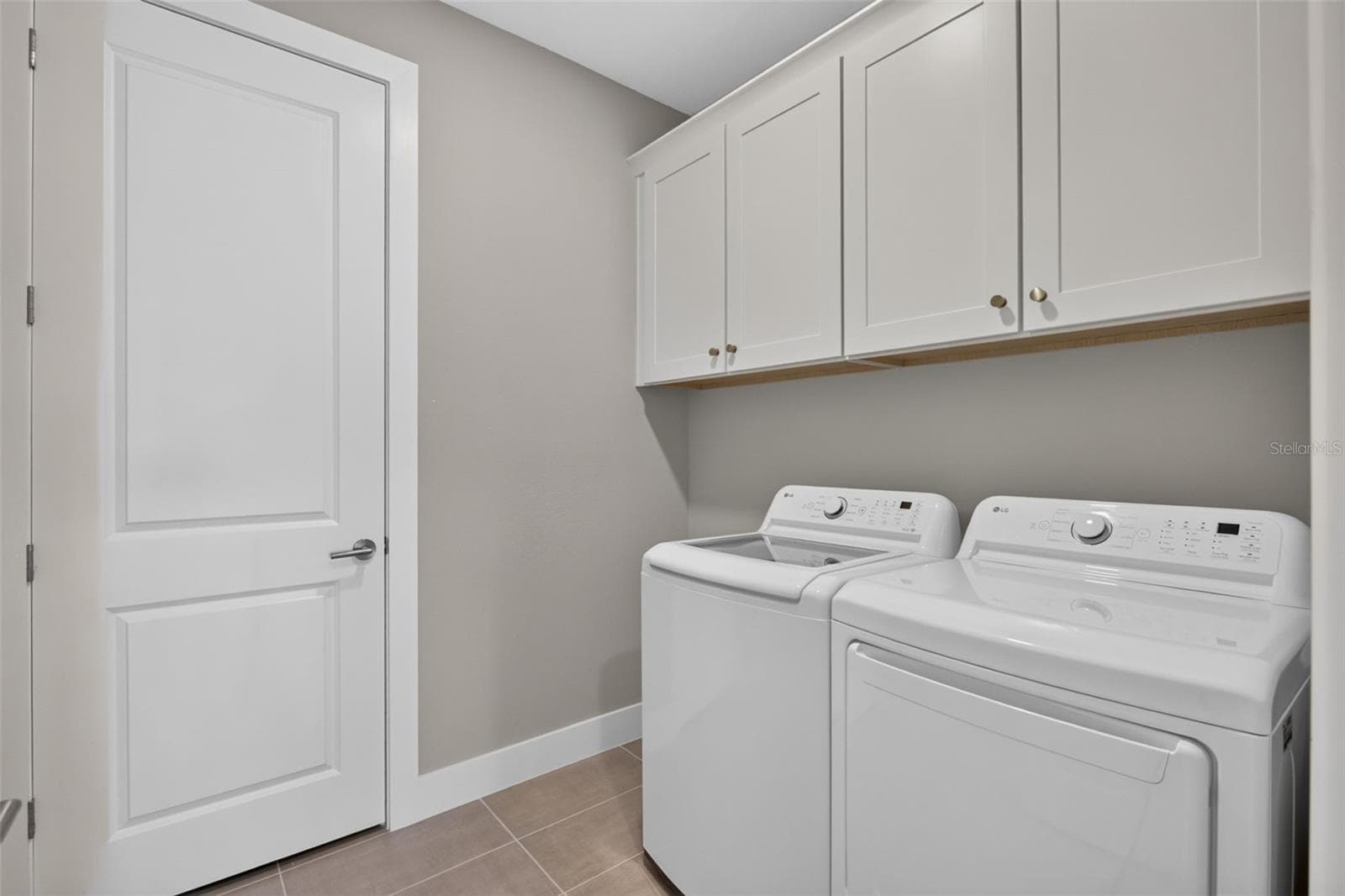 Laundry Room with Cabinetry - 18911 DAYSPRING PL, VENICE