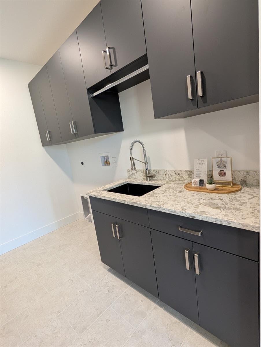 Custom cabinetry in main floor laundry - 2110 MICHELE DR, SARASOTA