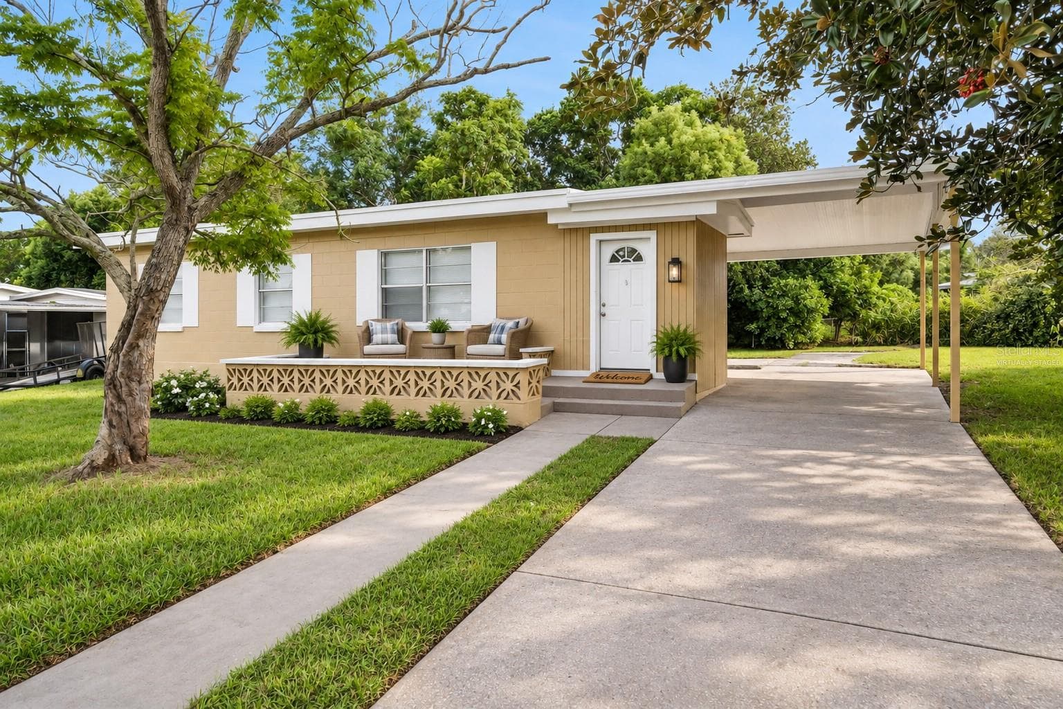 Virtually staged front patio - 928 VIVIAN TER, DELTONA