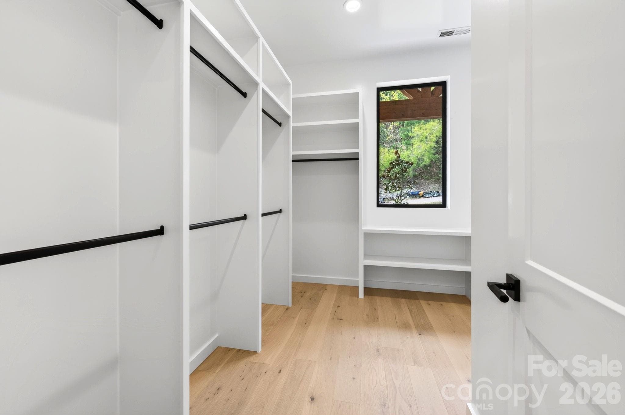 Primary bedroom walk in closet - 77 Camsyn Drive, Weaverville