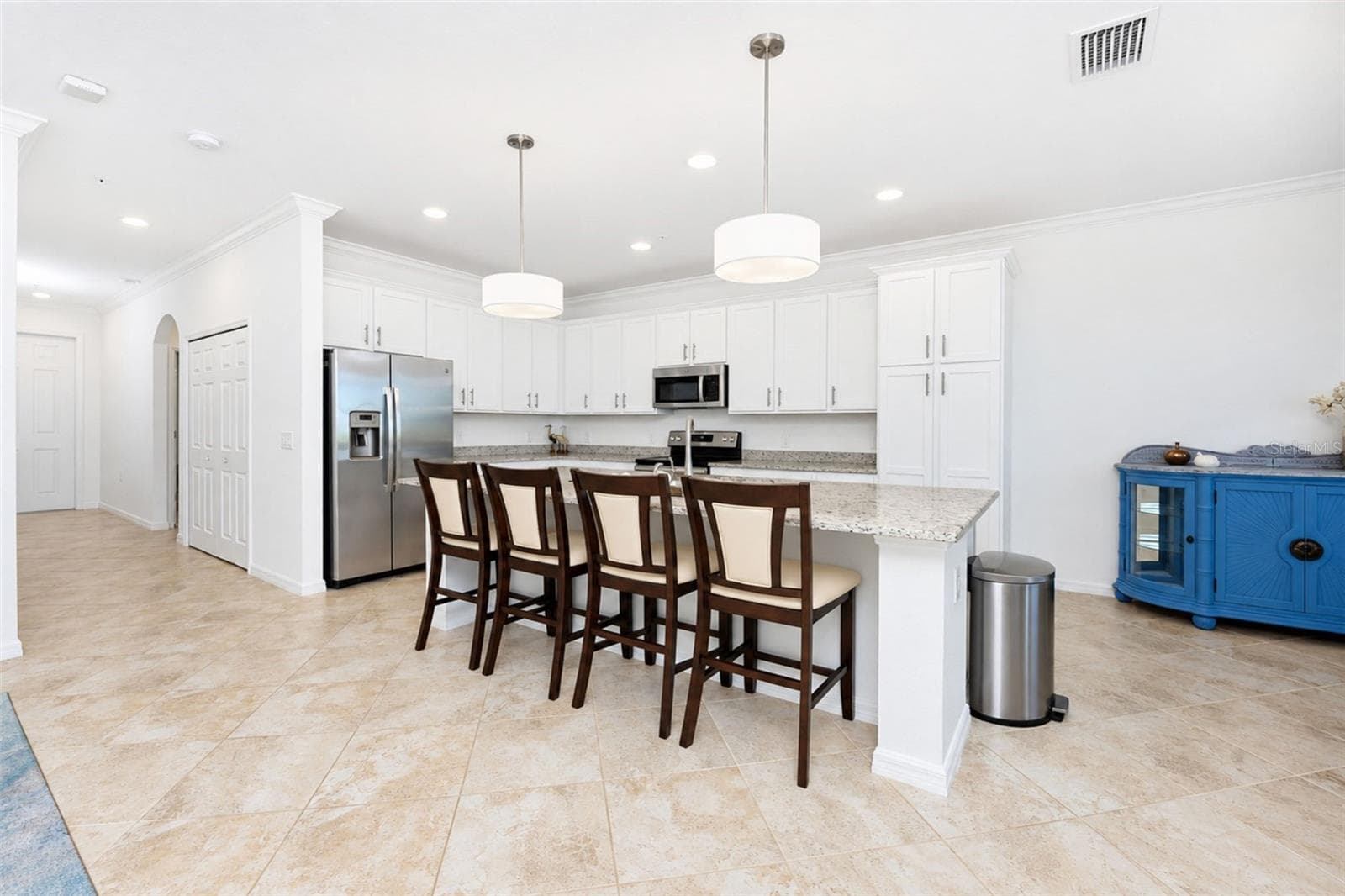 Kitchen toward hallway - 14071 HERITAGE LANDING BLVD #346, PUNTA GORDA