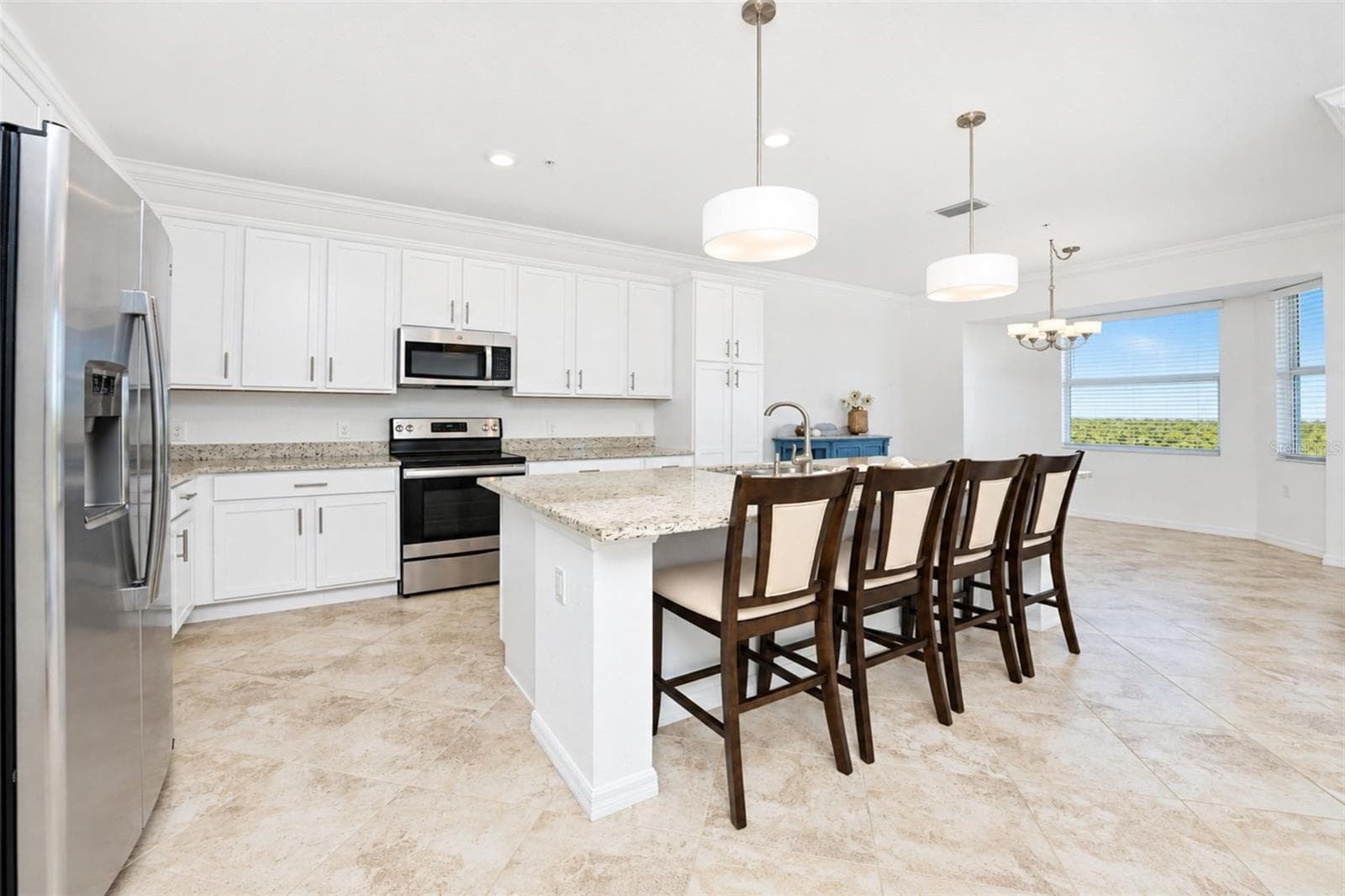 Kitchen toward Dining - 14071 HERITAGE LANDING BLVD #346, PUNTA GORDA