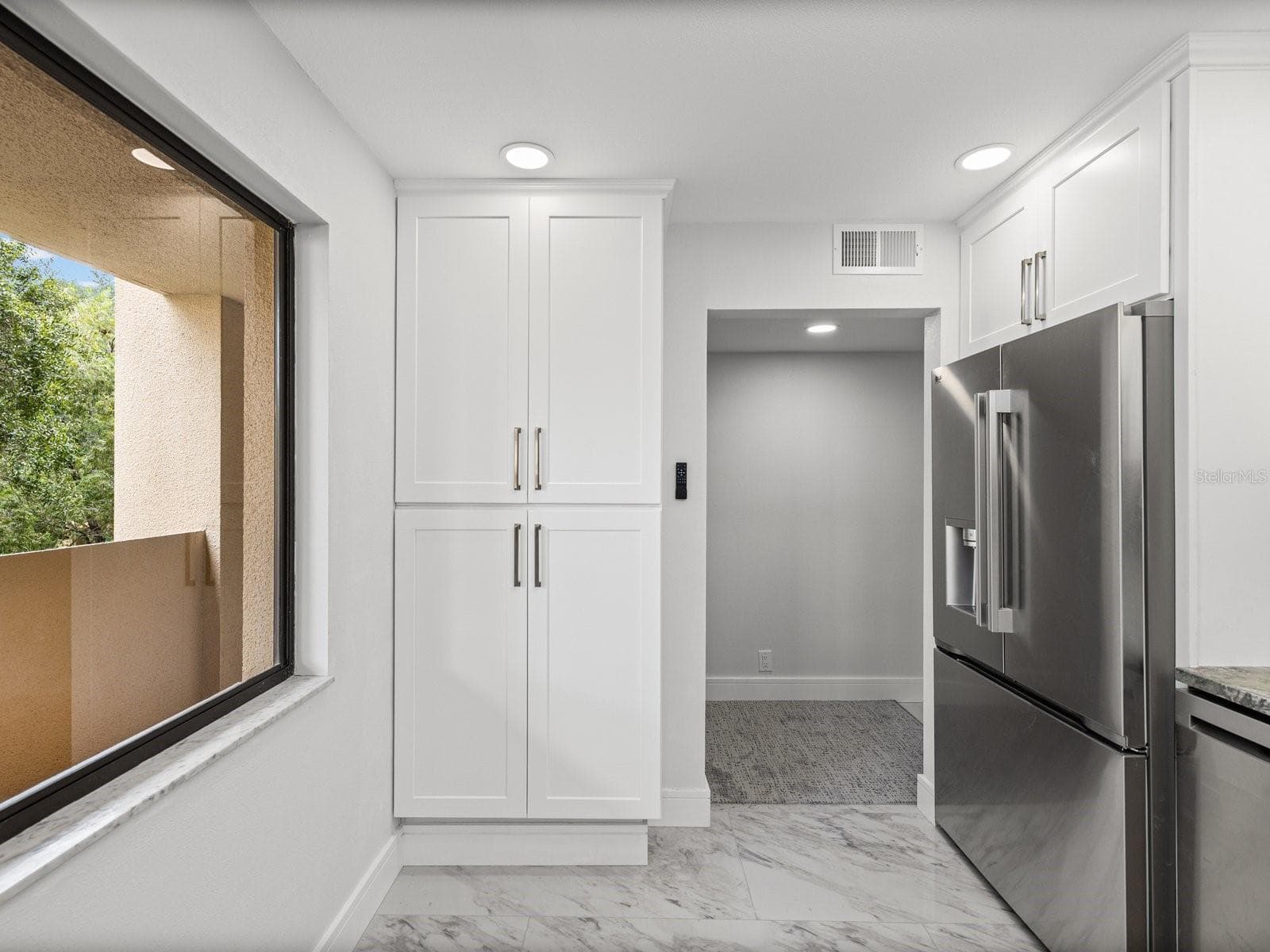 Pantry built in and NEW counter depth LG French door refrigerator - 3076 EASTLAND BLVD #203, CLEARWATER