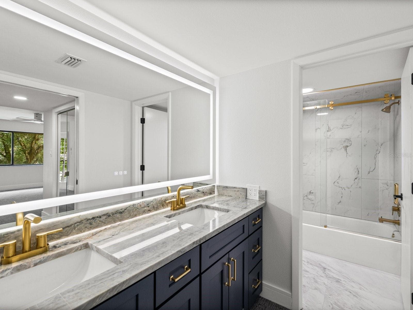 Primary bath with NEW tub shower combo and water closet - 3076 EASTLAND BLVD #203, CLEARWATER