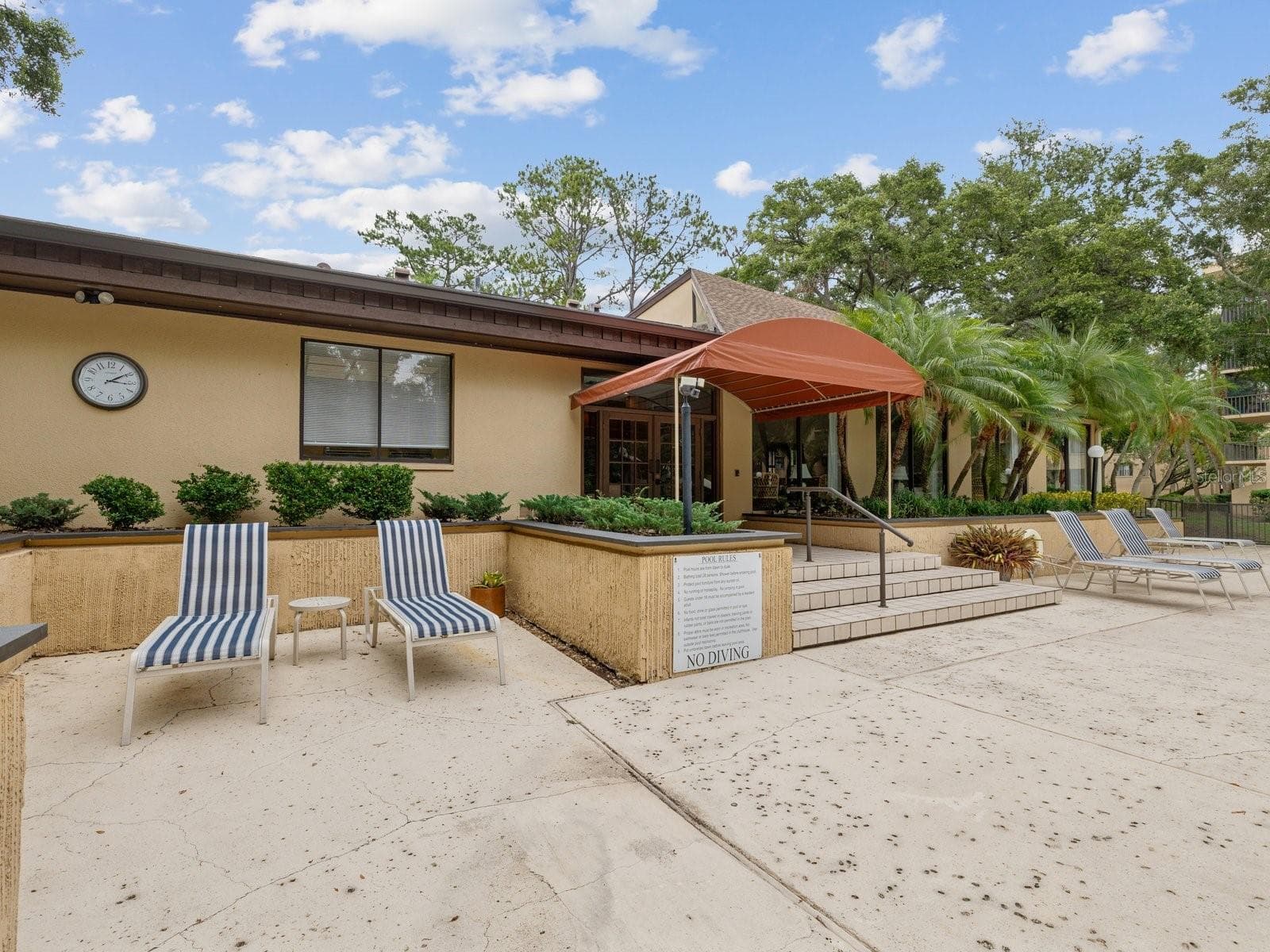 Clubhouse entry by pool - 3076 EASTLAND BLVD #203, CLEARWATER