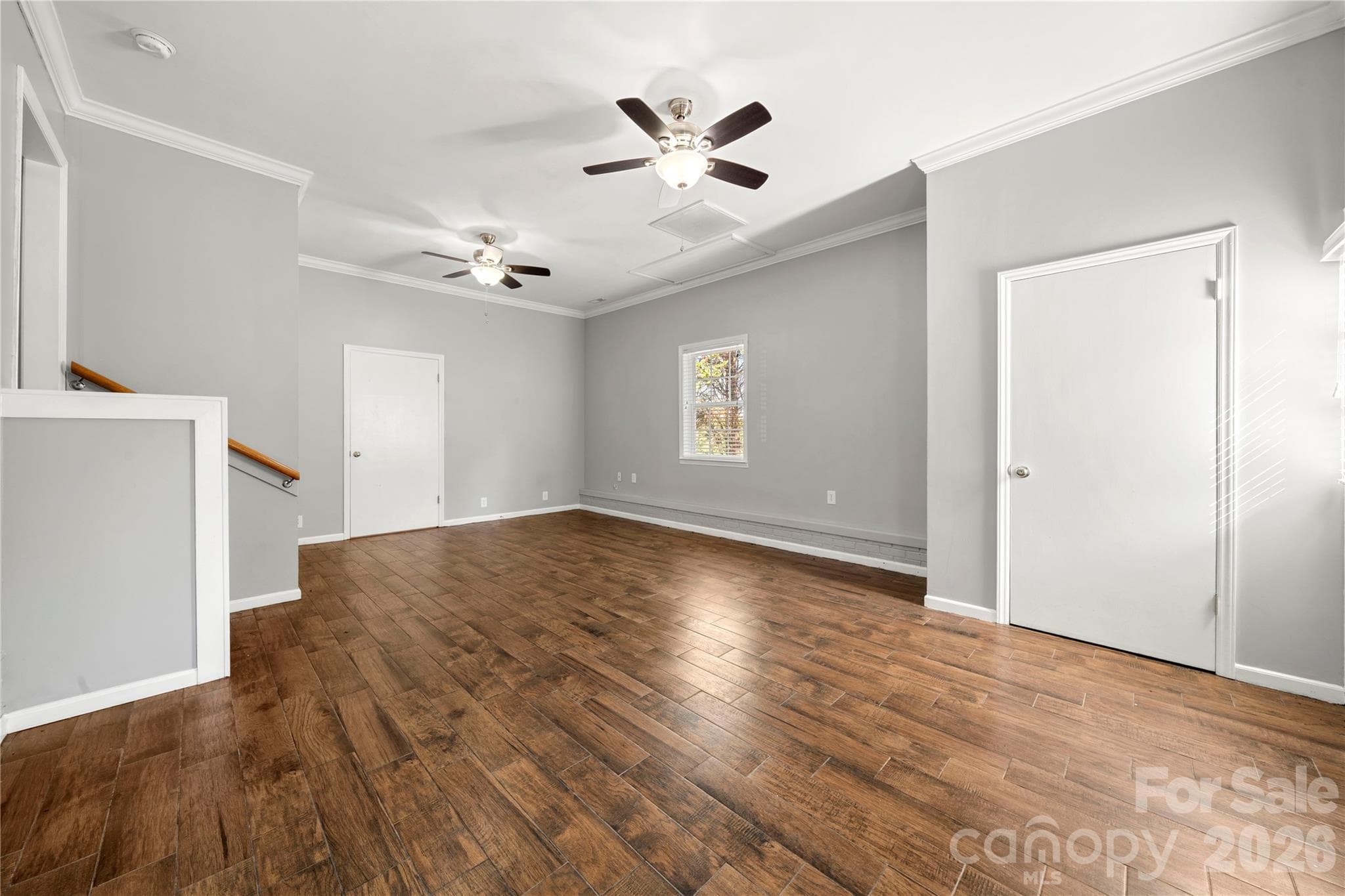Main level living/bonus room - this room has its own external entry and connects to the laundry room - 109 Woodside Avenue, Gastonia