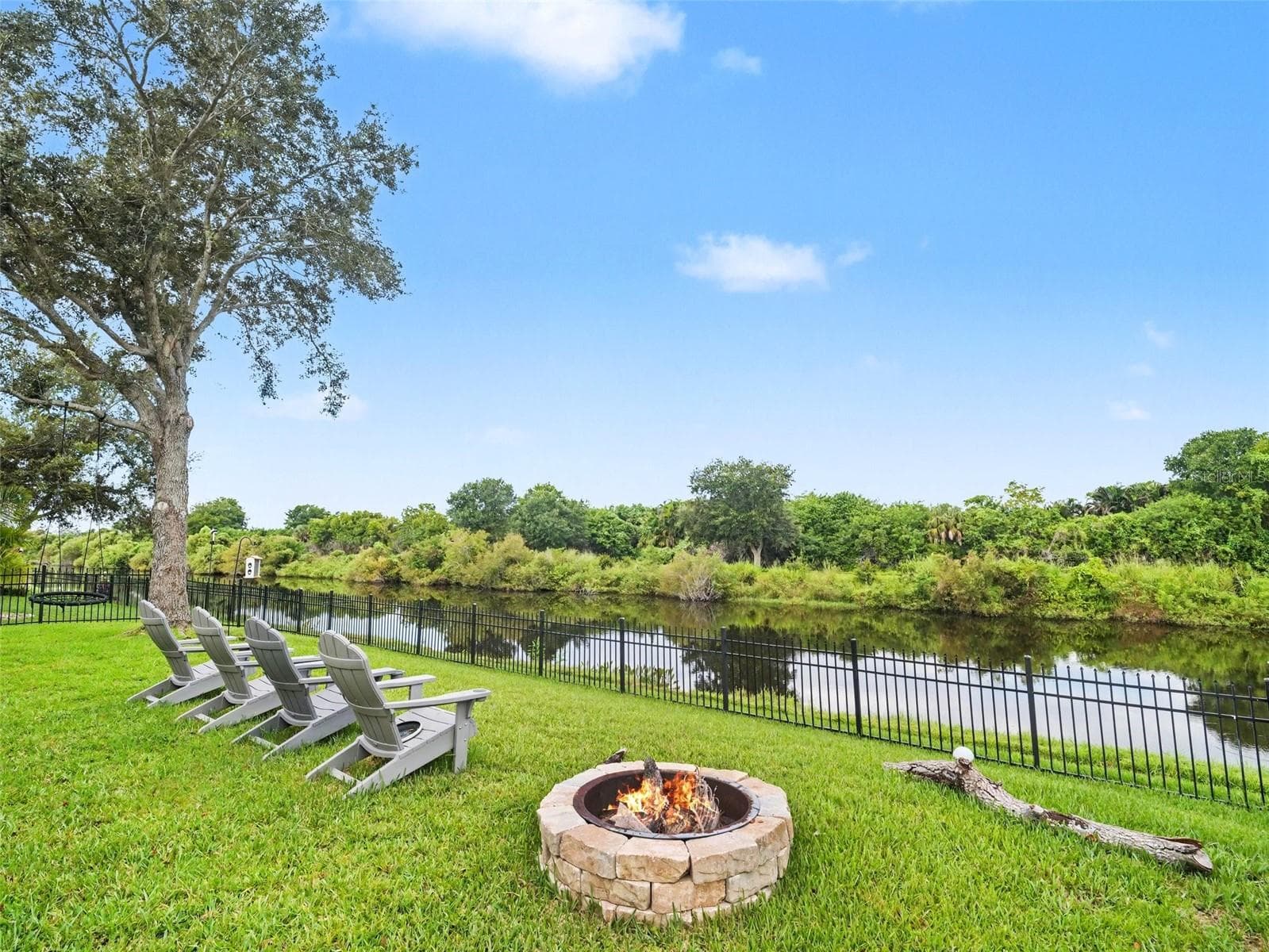 Fenced Backyard with a fire pit - 7124 34TH ST E, SARASOTA