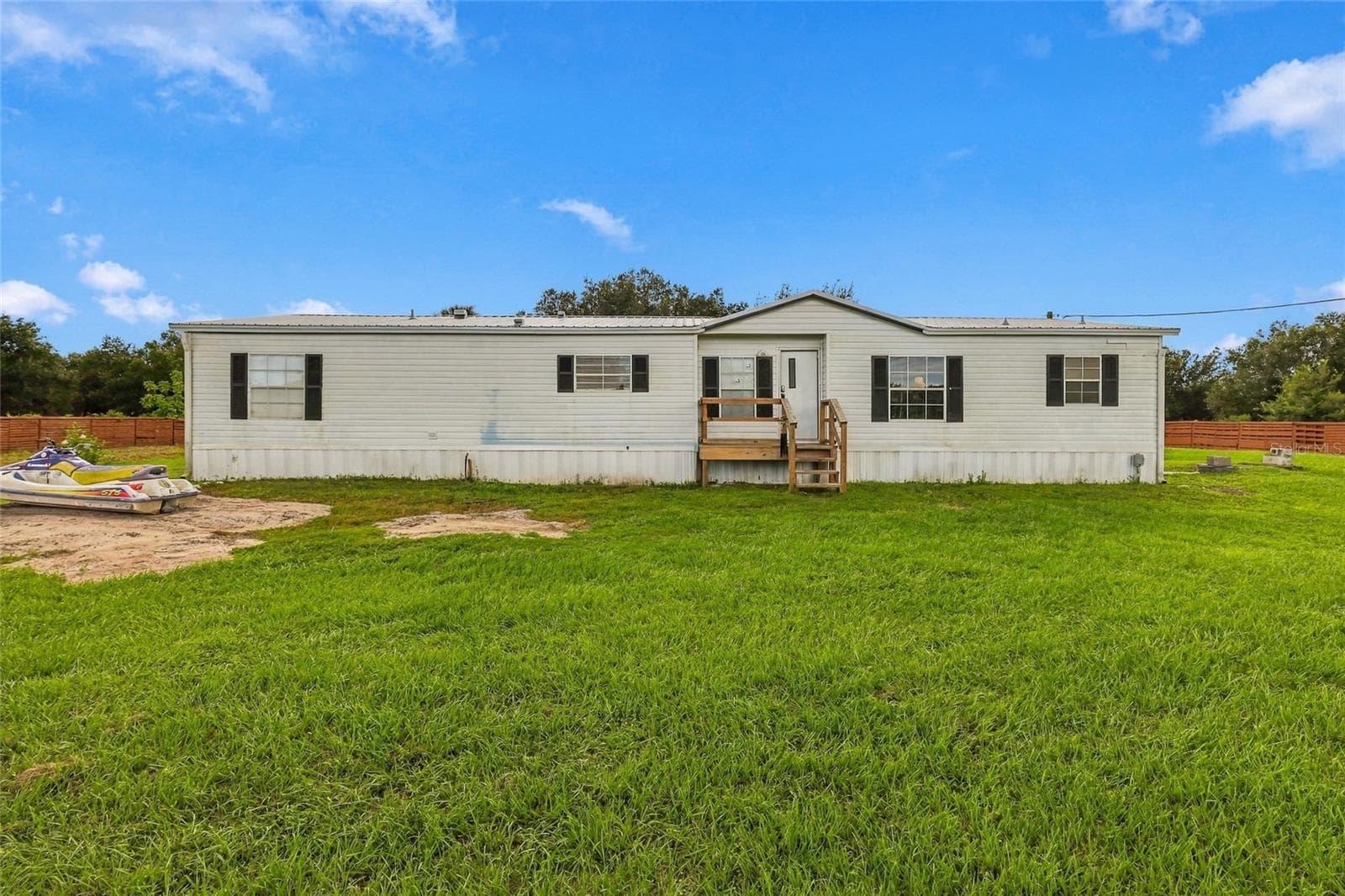 Manufactured Home at 19046 NW 302ND ST, OKEECHOBEE, photo 3 of 52